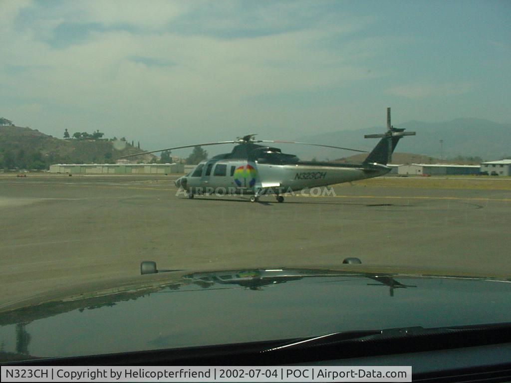 N323CH, 1980 Sikorsky S-76A C/N 760095, Picking up a child at Brackett
