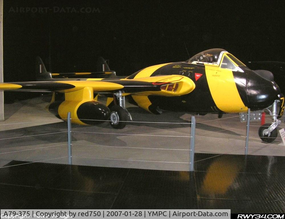 A79-375, 1950 De Havilland Australia DH-100 Vampire F.30 C/N DHA4011, De Havilland Vampire F Mk 30 painted in high visibilty colours for use as a target tug. RAAF Museum Point Cook