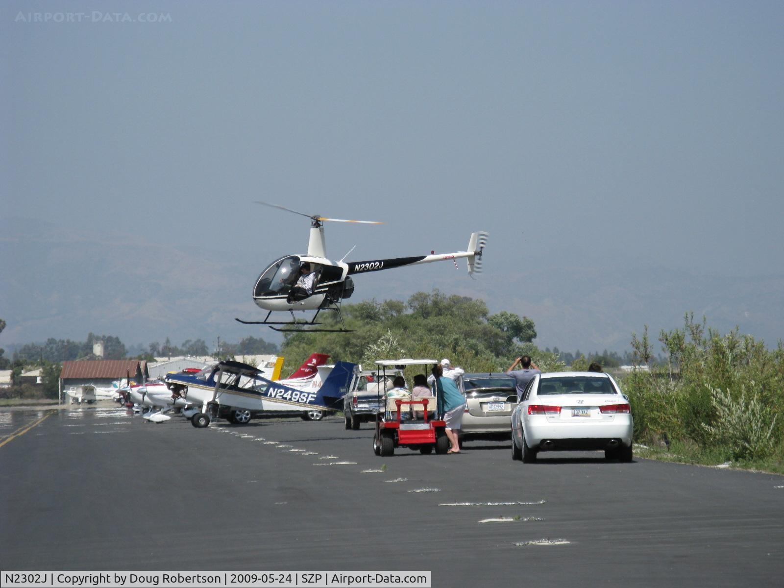 N2302J, 1946 Robinson R22 Beta C/N 1946, 1946 (sic) Robinson R22 BETA, Lycoming O-320, takeoff/hover, popular rides