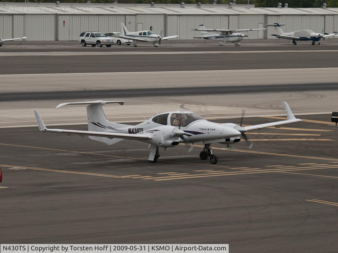 N430TS, 2006 Diamond DA-42 Twin Star C/N 42.AC030, N430TS after crossing the runway