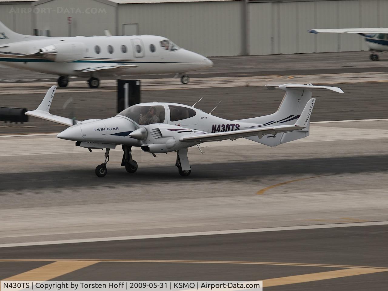 N430TS, 2006 Diamond DA-42 Twin Star C/N 42.AC030, N430TS departing from RWY 21