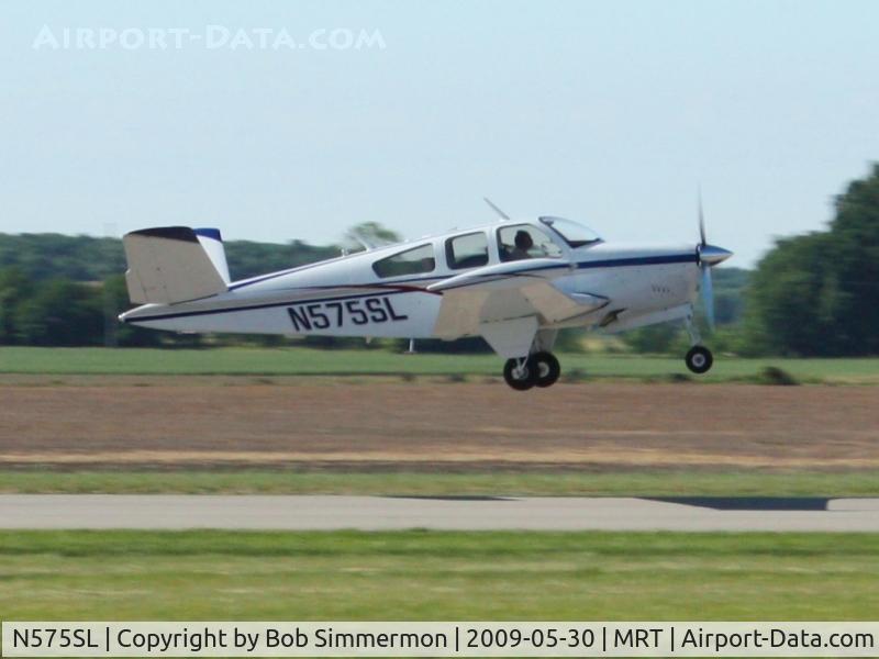 N575SL, 1964 Beech S35 Bonanza C/N D-7342, Departing Marysville, Ohio