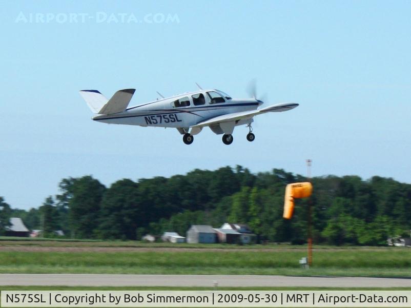 N575SL, 1964 Beech S35 Bonanza C/N D-7342, Departing Marysville, Ohio