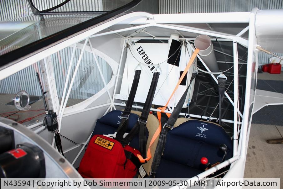 N43594, 2007 Sorrell SNS-9 Hiperlight C/N 006, The orange strap has a weight tied to the end used to slide down the tube for weight and balance tests. In her crib at Marysville, Ohio.