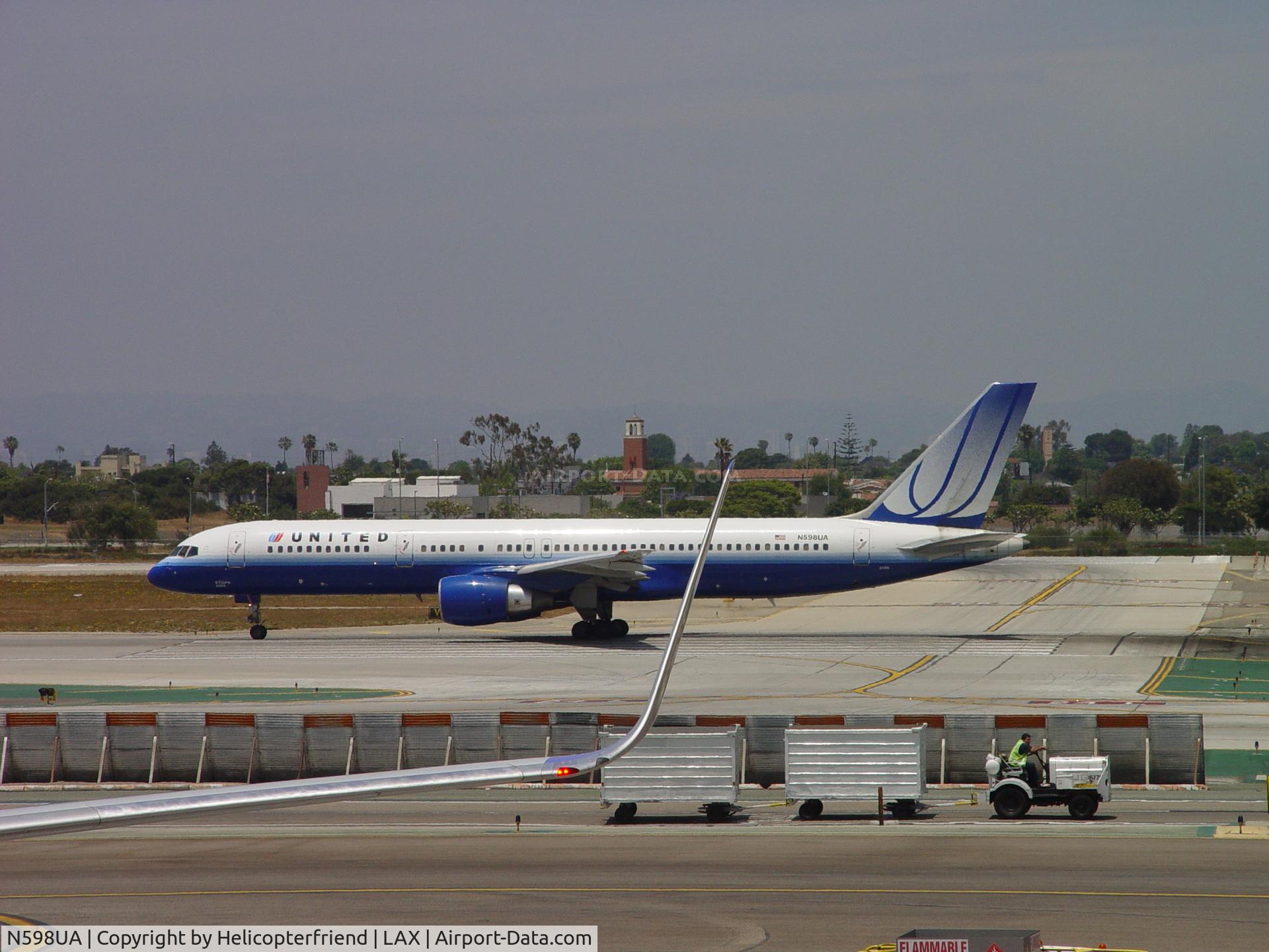 N598UA, 1999 Boeing 757-222 C/N 28751, Starting to roll westbound on 24L