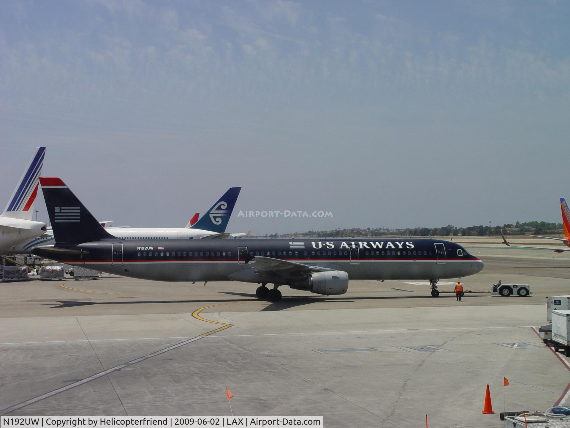 N192UW, 2001 Airbus A321-211 C/N 1496, Being pushed back to taxi and take off