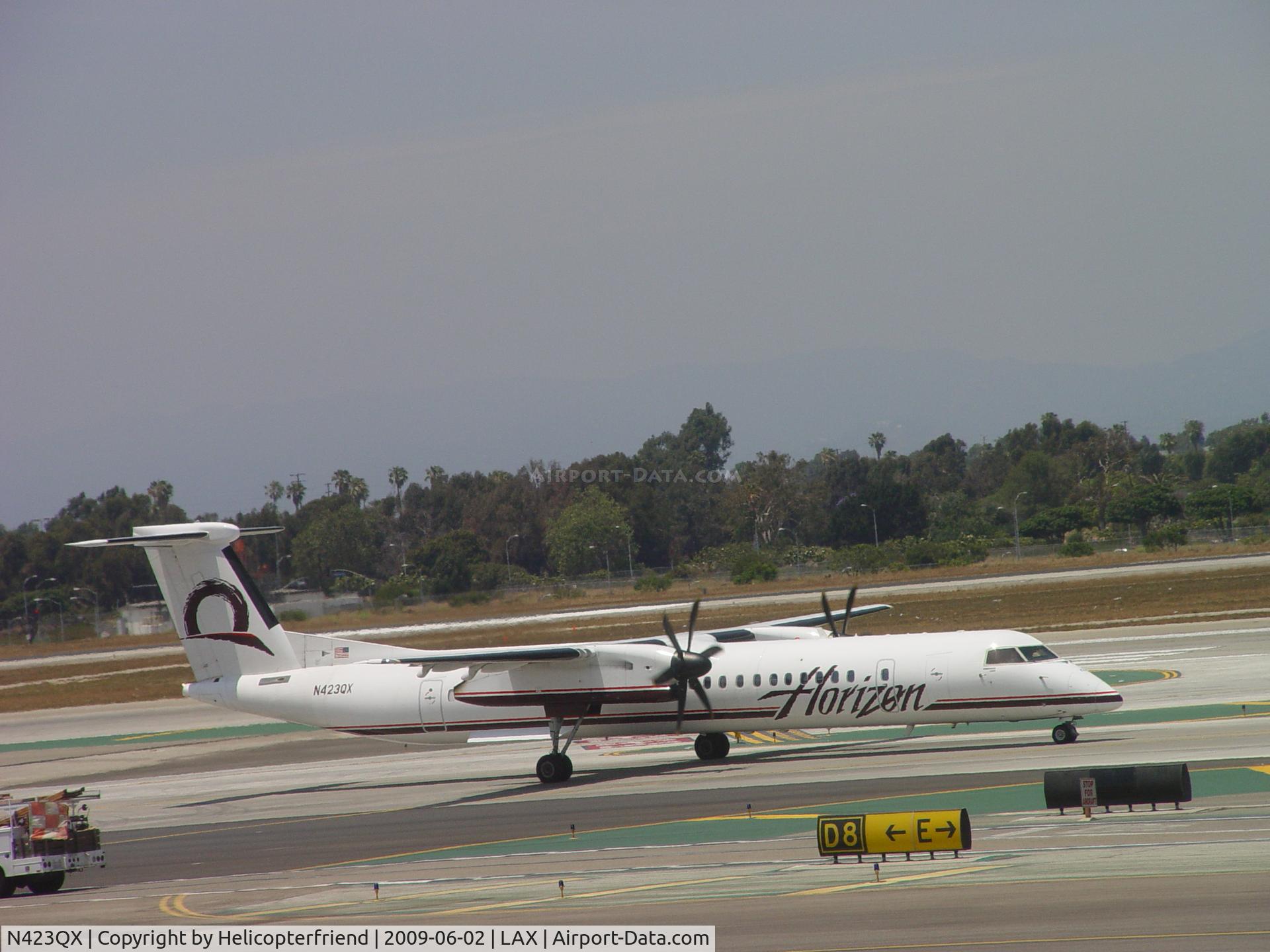 N423QX, 2007 Bombardier DHC-8-402 Dash 8 C/N 4153, Taxiing to Runway 24L