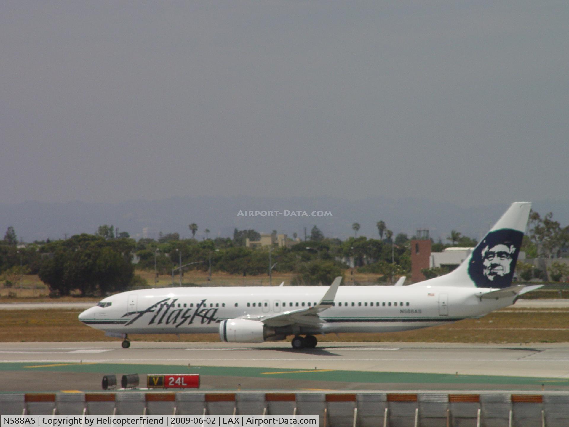 N588AS, 2007 Boeing 737-890 C/N 35685, Rolling westbound for take off on 24L