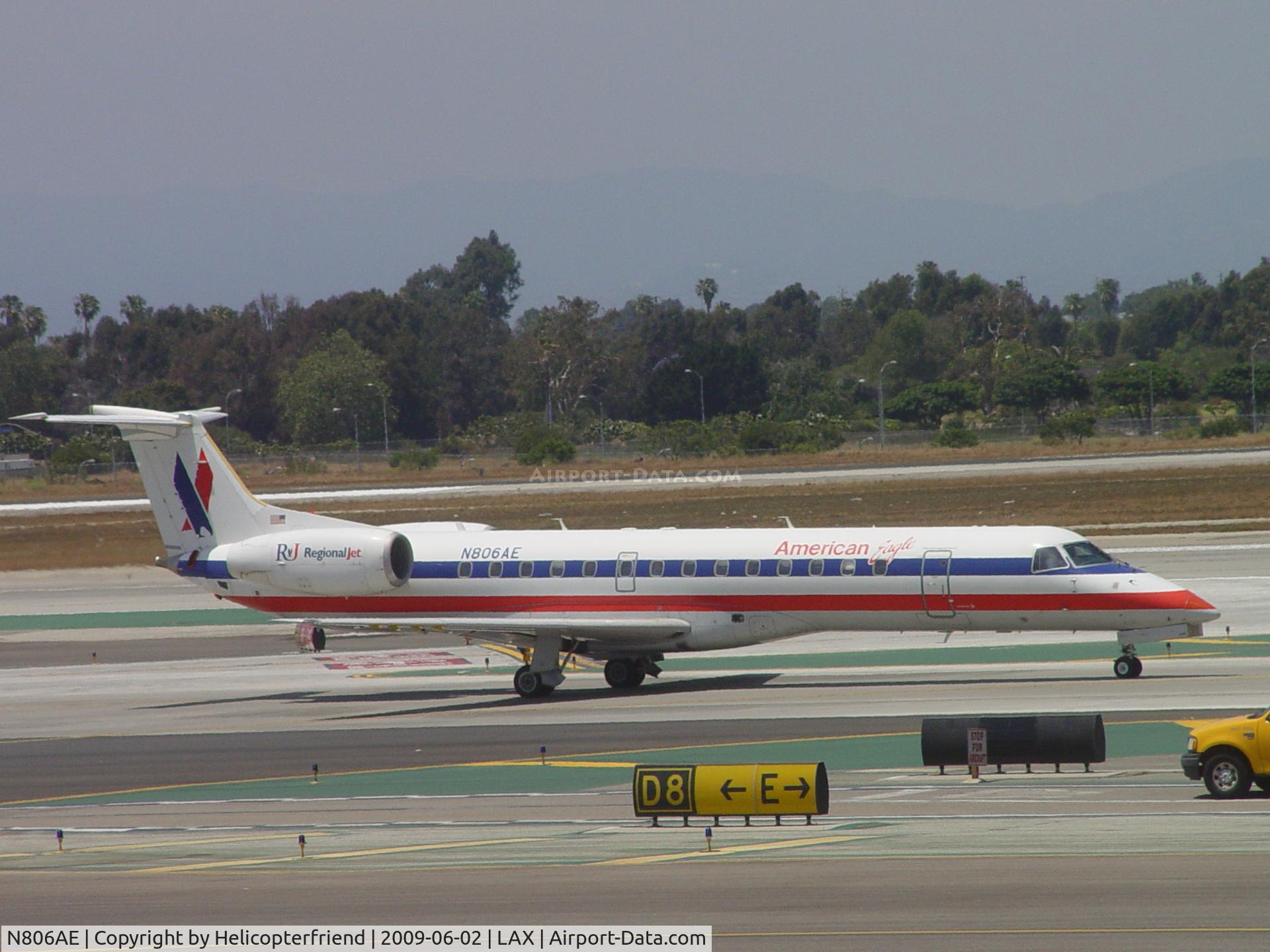 N806AE, 2001 Embraer ERJ-140LR (EMB-135KL) C/N 145503, Taxiing to Runway 24L