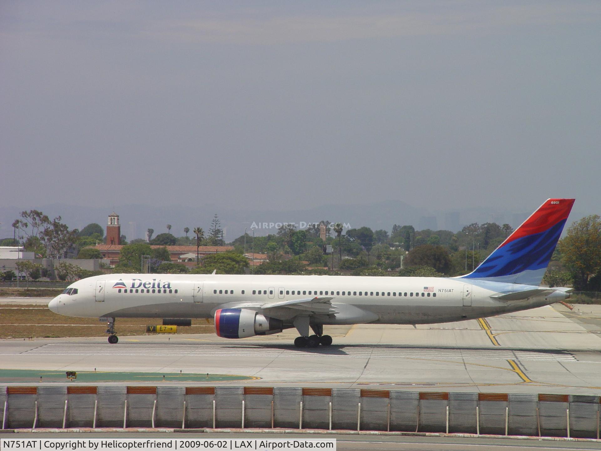 N751AT, 1984 Boeing 757-212 C/N 23125, Starting take off roll westbound 24L