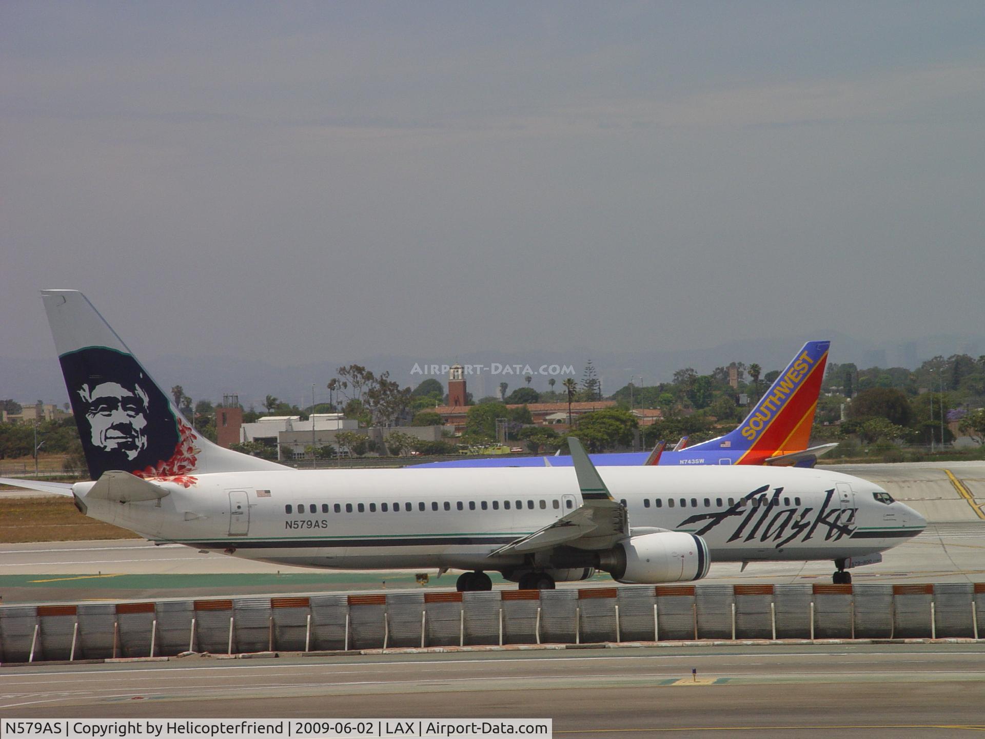 N579AS, 2007 Boeing 737-890 C/N 35187, Alaska moving up and waiting for Southwest to depart