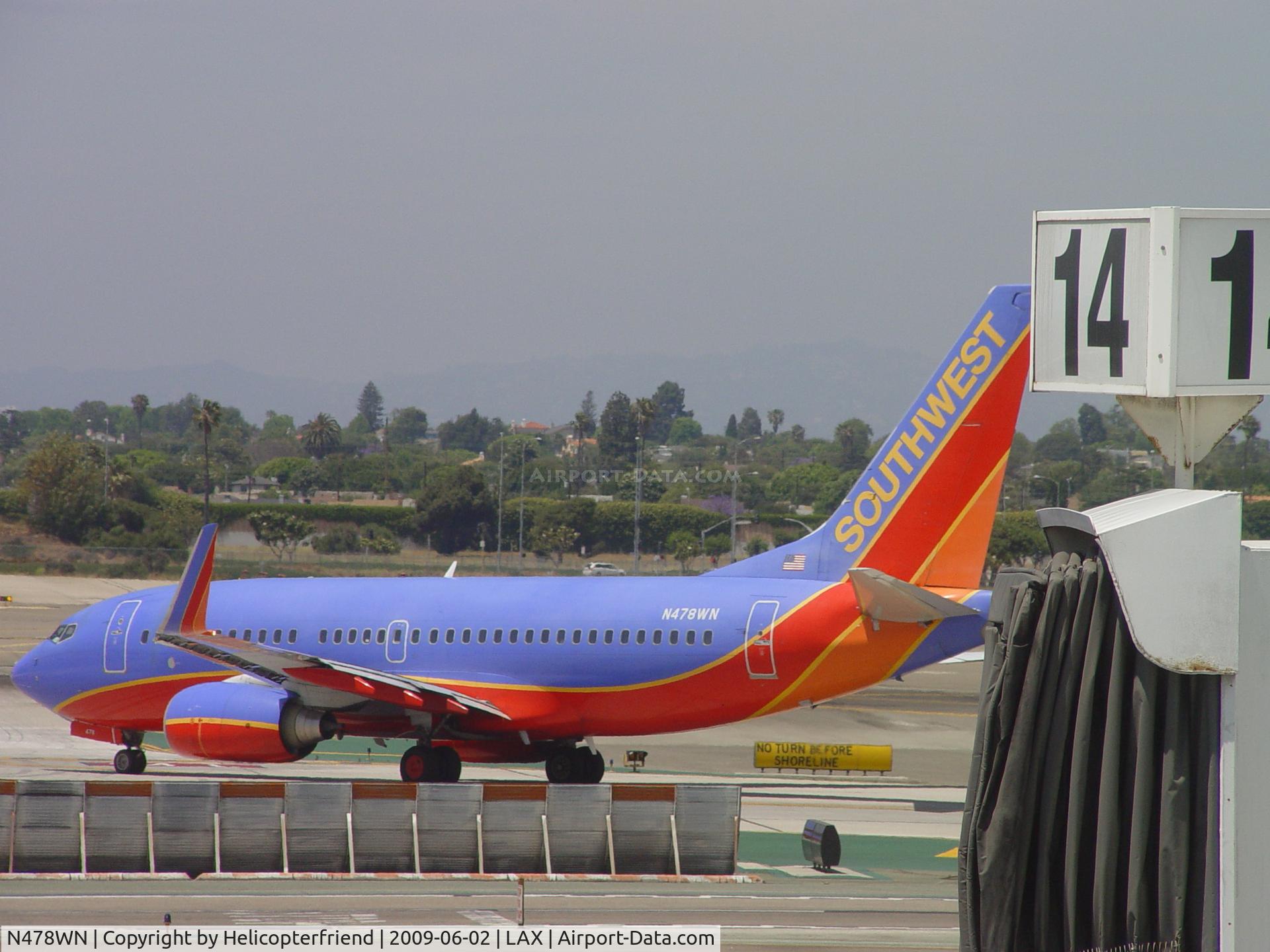 N478WN, 2004 Boeing 737-7H4 C/N 33989, Entering Runway 24L with advisory 