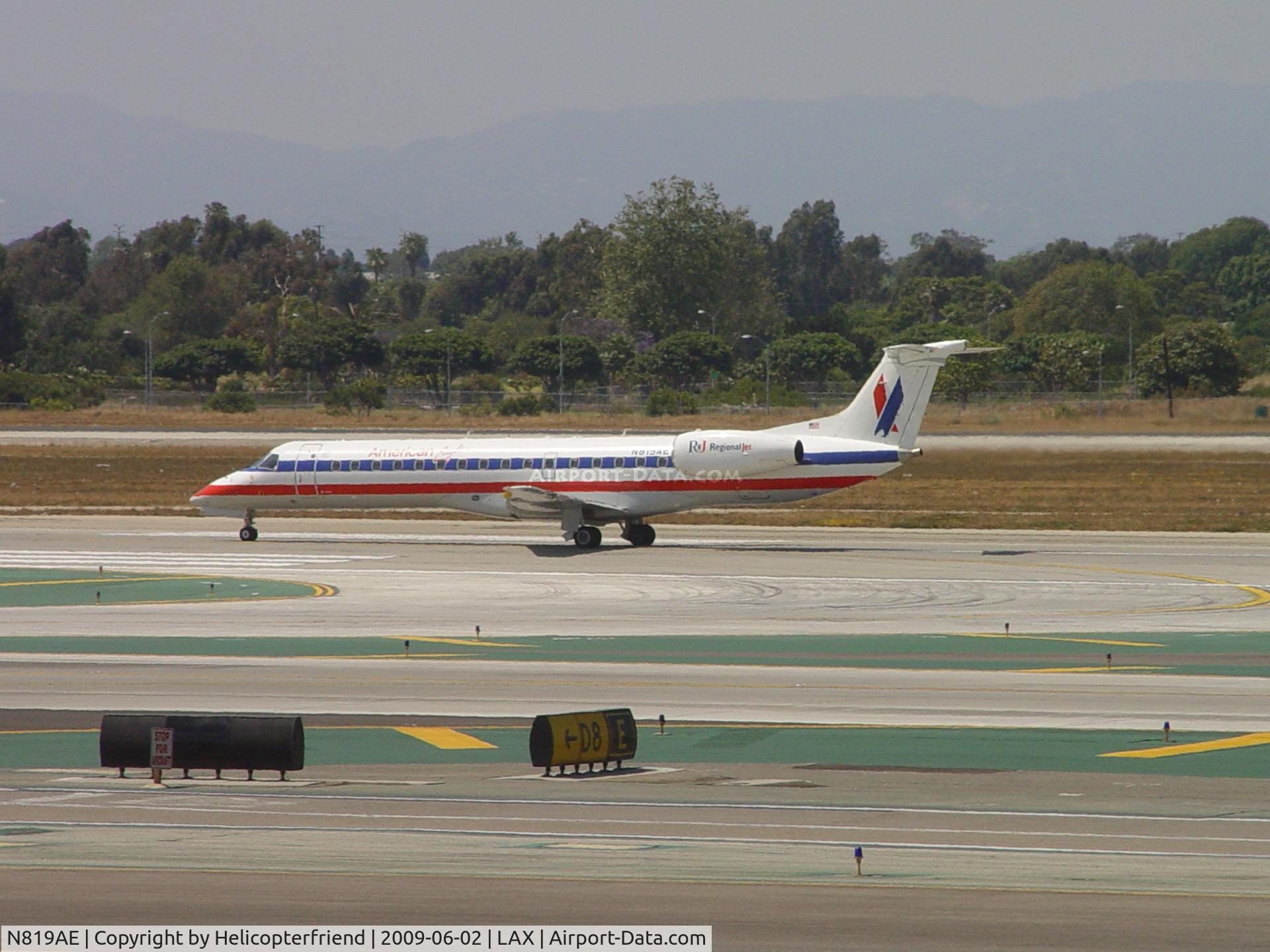 N819AE, 2002 Embraer ERJ-140LR (EMB-135KL) C/N 145566, Starting take off roll westbound
