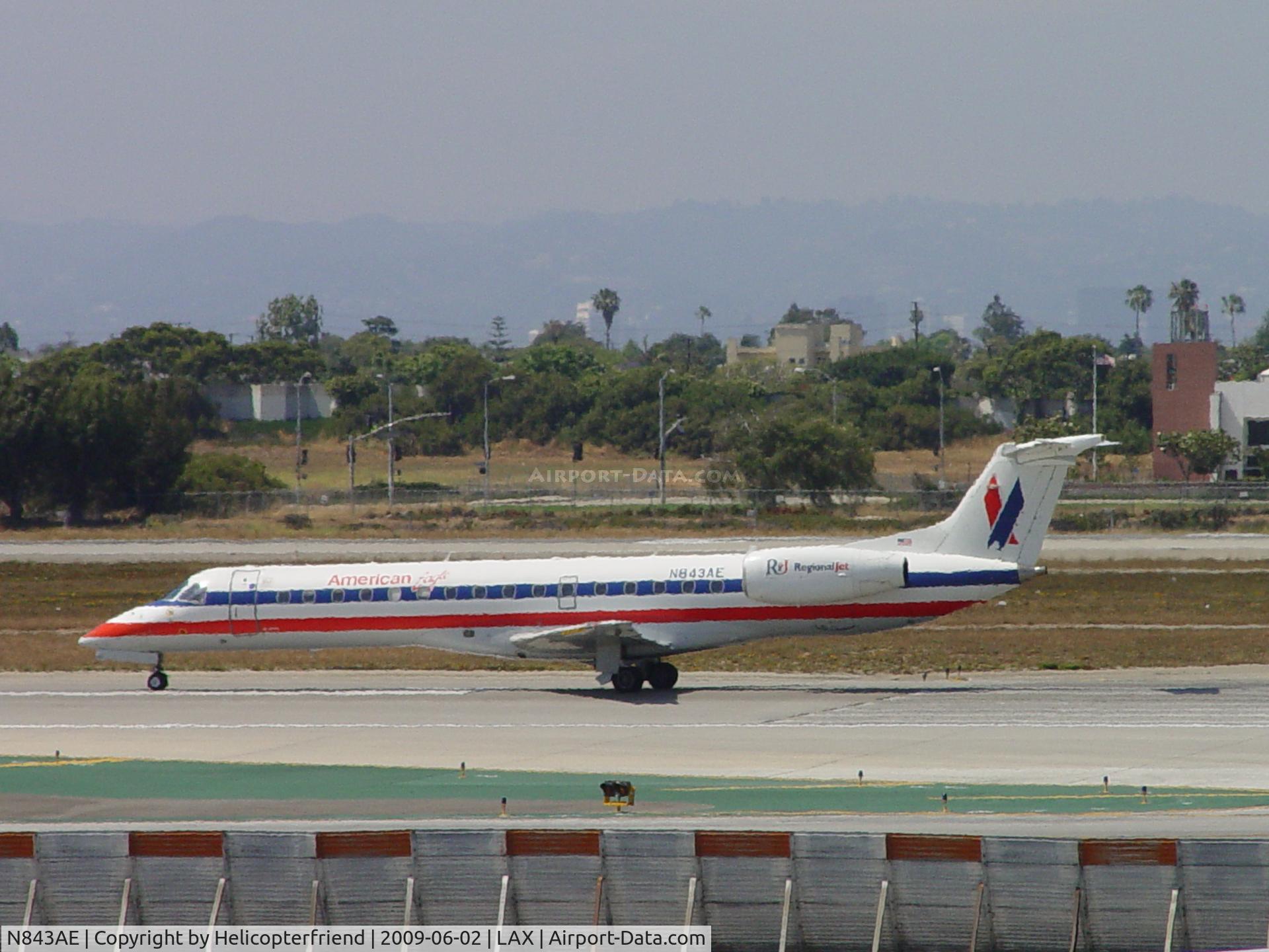 N843AE, 2003 Embraer ERJ-140LR (EMB-135KL) C/N 145680, Starting westbound roll for take off