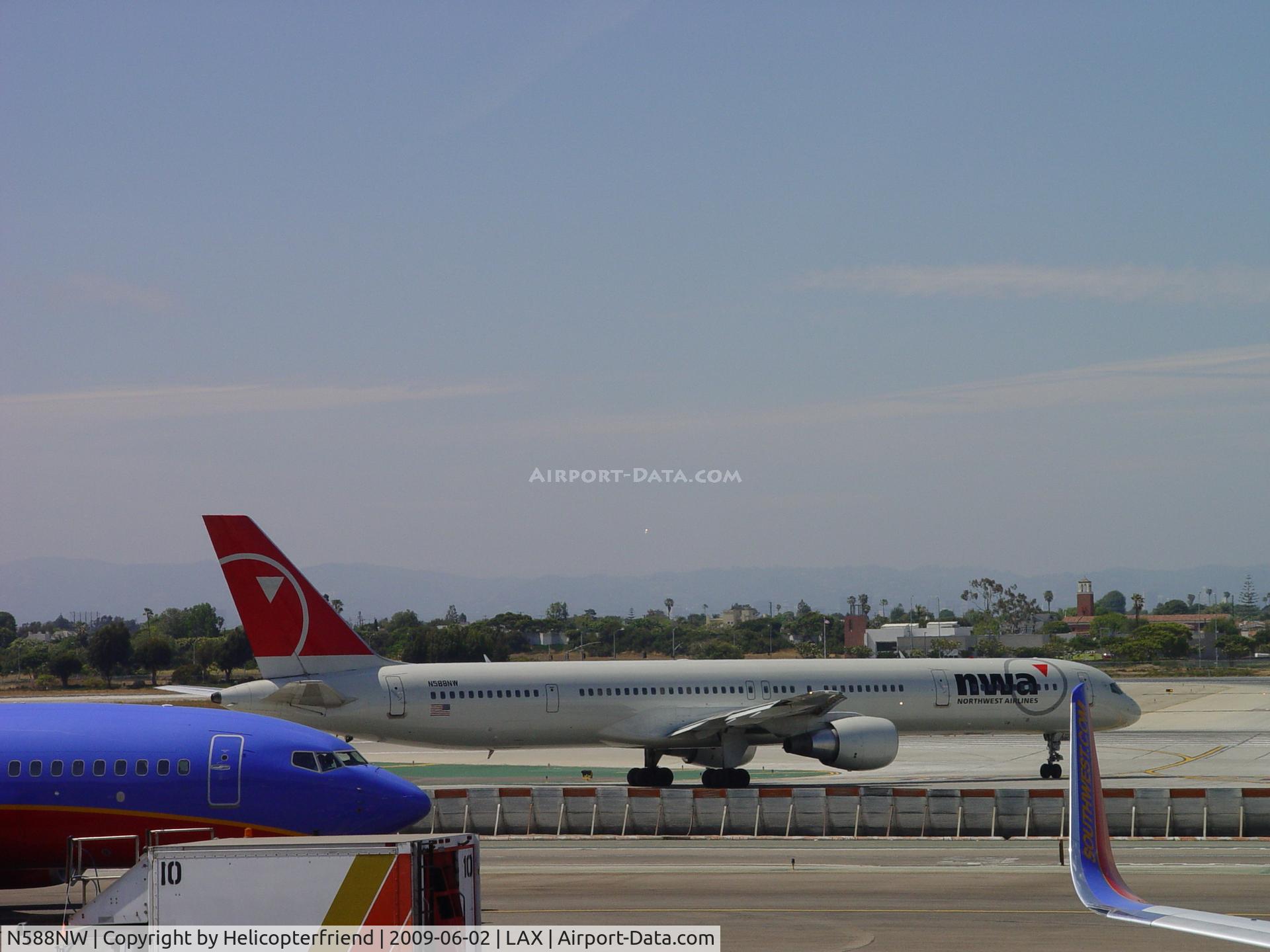 N588NW, 2003 Boeing 757-351 C/N 32988, Taxiing onto 24L ready for take off