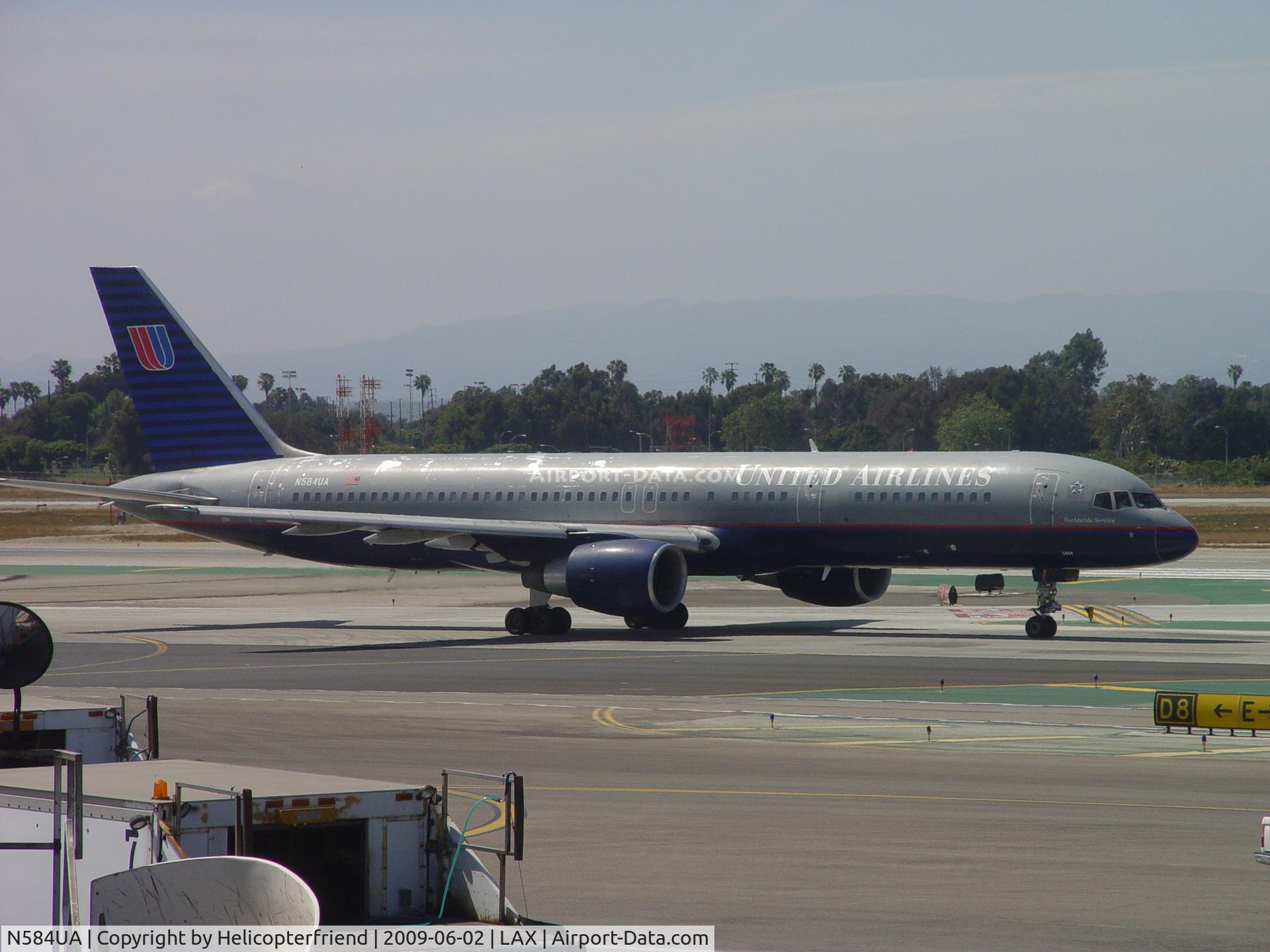 N584UA, 1993 Boeing 757-222 C/N 26706, Taxiing to 24L