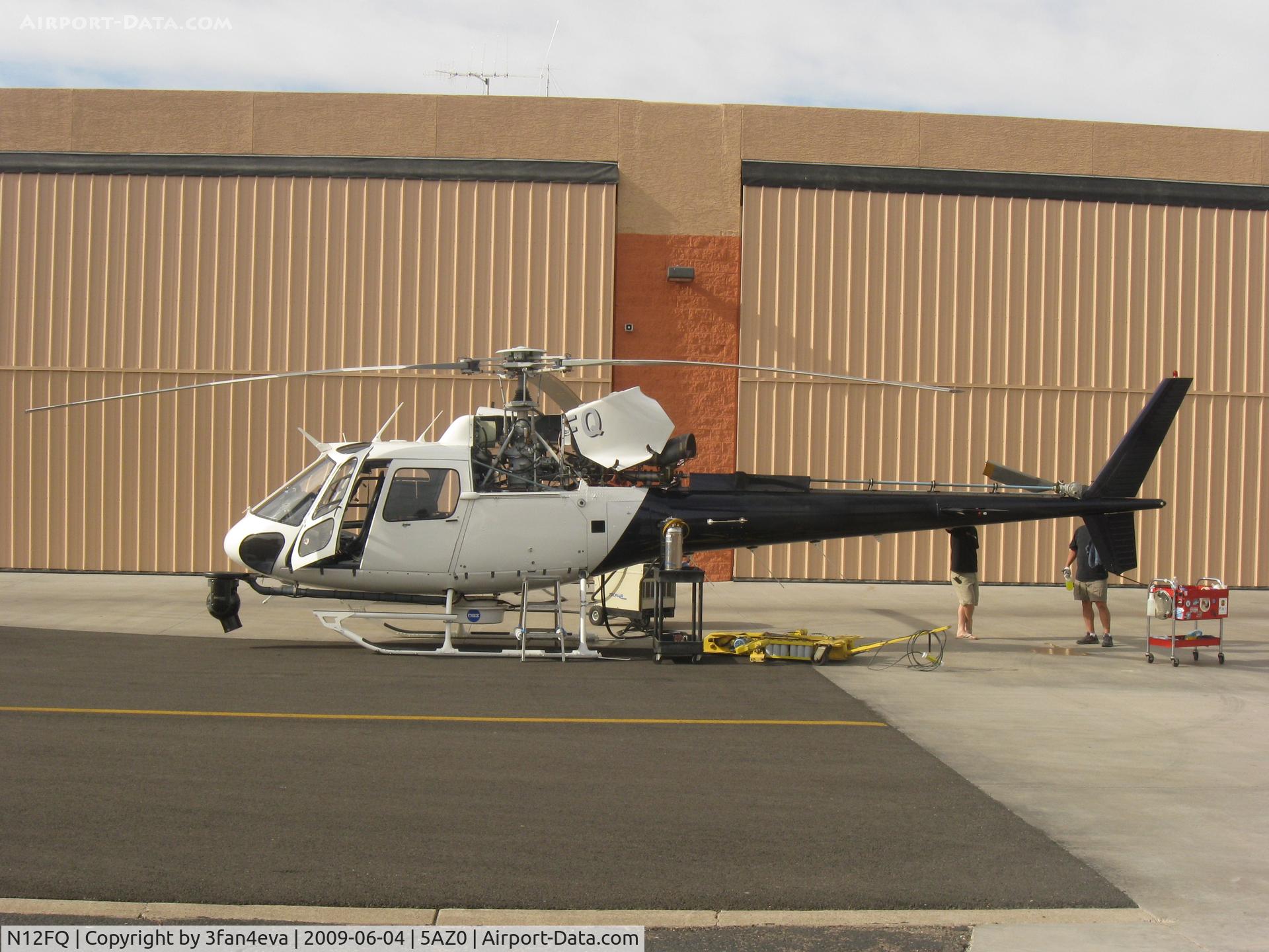 N12FQ, 2003 Eurocopter AS-350B-2 Ecureuil C/N 3726, N12FQ Undergoing 100 hour checkup outside the hanger