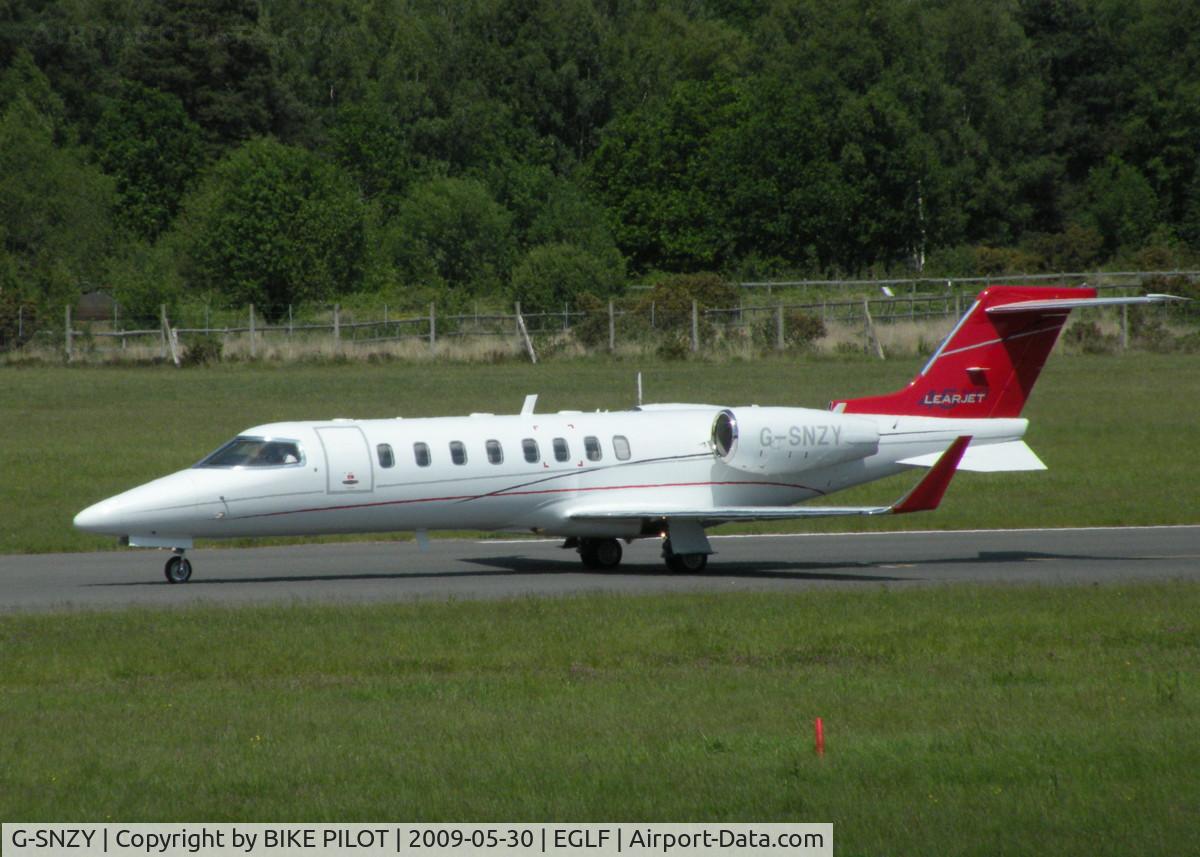 G-SNZY, 2008 Learjet 45 C/N 45-375, BACK TRACKING ALONG RWY 06