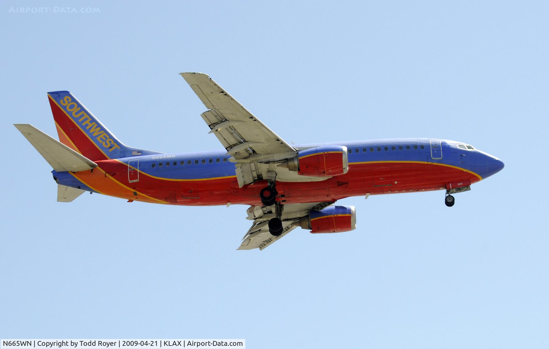 N665WN, 1986 Boeing 737-3Y0 C/N 23497, Landing 24R at LAX