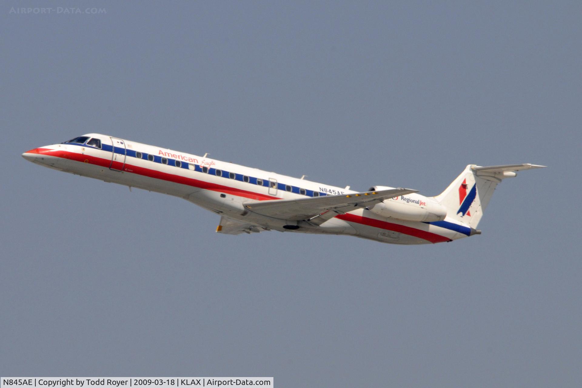 N845AE, 2003 Embraer ERJ-140LR (EMB-135KL) C/N 145685, Departing LAX on 25R