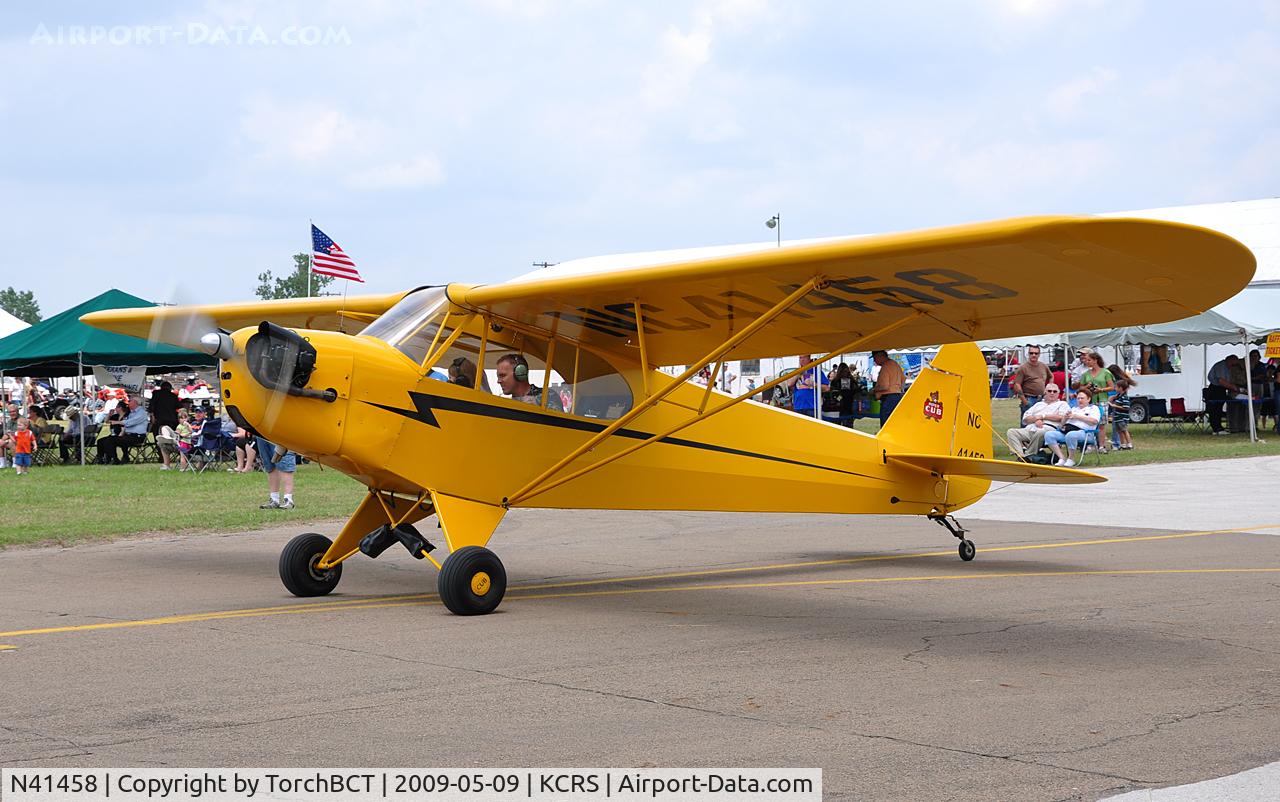 N41458, 1941 Piper J3C-65 Cub C/N 8095, Piper Cub taxiing to RWY 14 during Corsicana Airsho 09.