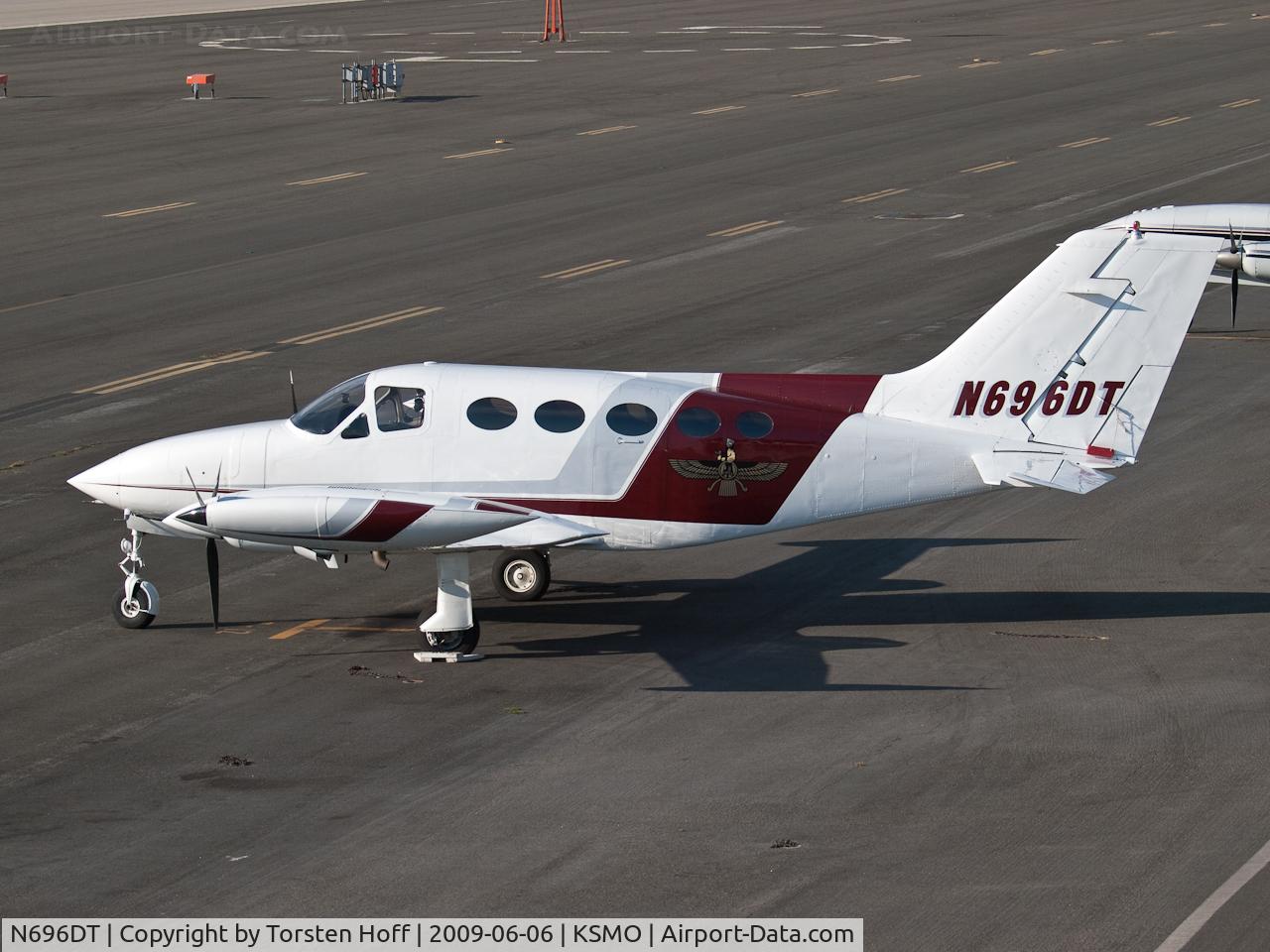 N696DT, 1973 Cessna 414 Chancellor Chancellor C/N 414-0370, N696DT parked on the tarmac at KSMO