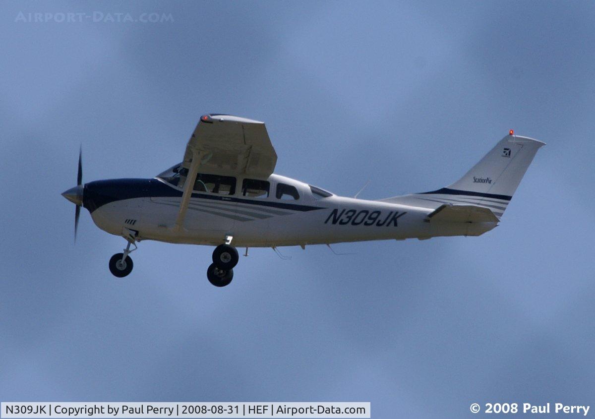 N309JK, 2004 Cessna 206H Stationair C/N 20608219, A clean looking Stationair getting aloft
