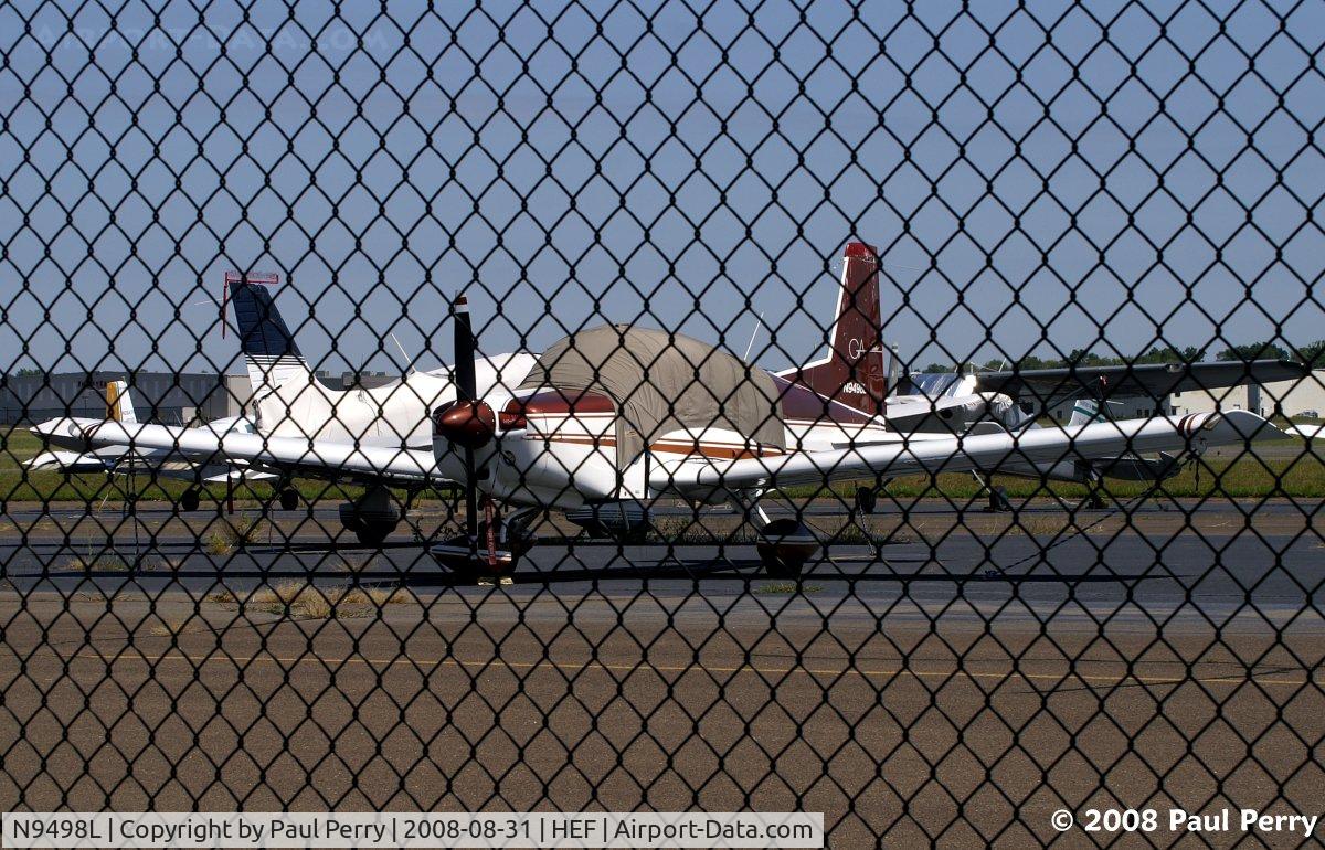 N9498L, 1972 American AA-5 C/N AA5-0238, Sweet looking burgundy cat on the ramp