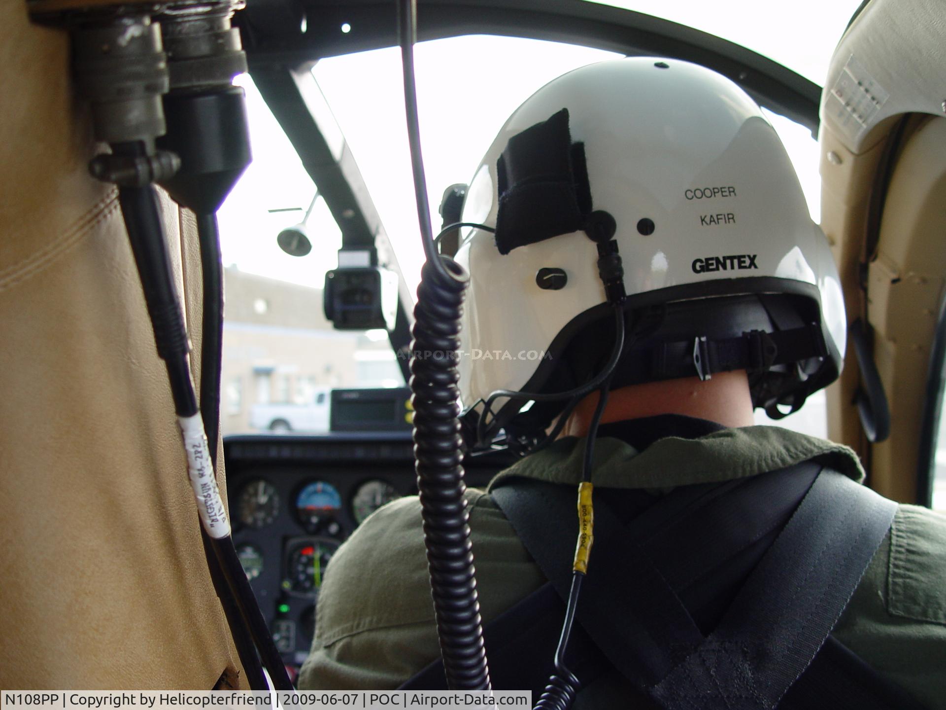 N108PP, 2008 MD Helicopters 369E C/N 0578E, FTO Cooper checking the flight deck