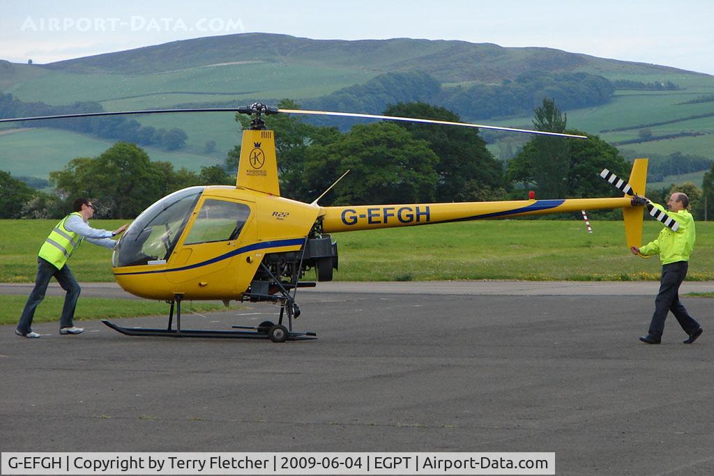 G-EFGH, 1990 Robinson R22 Beta C/N 1487, Robinson R22 being returned to its hangar after the last rotation of the day at Perth