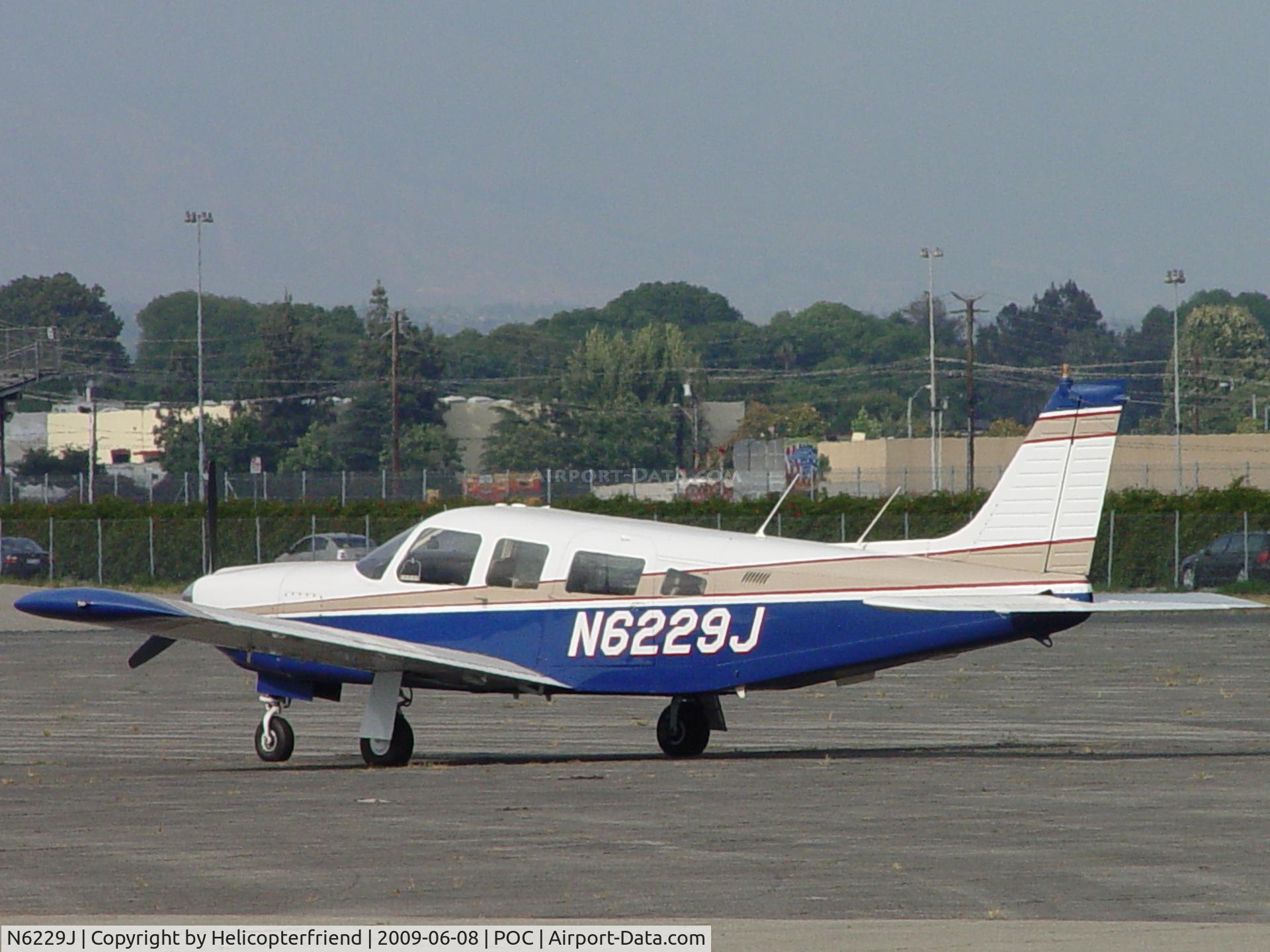 N6229J, 1976 Piper PA-32R-300 Cherokee Lance C/N 32R-7680336, Parked north of Howard Aviation