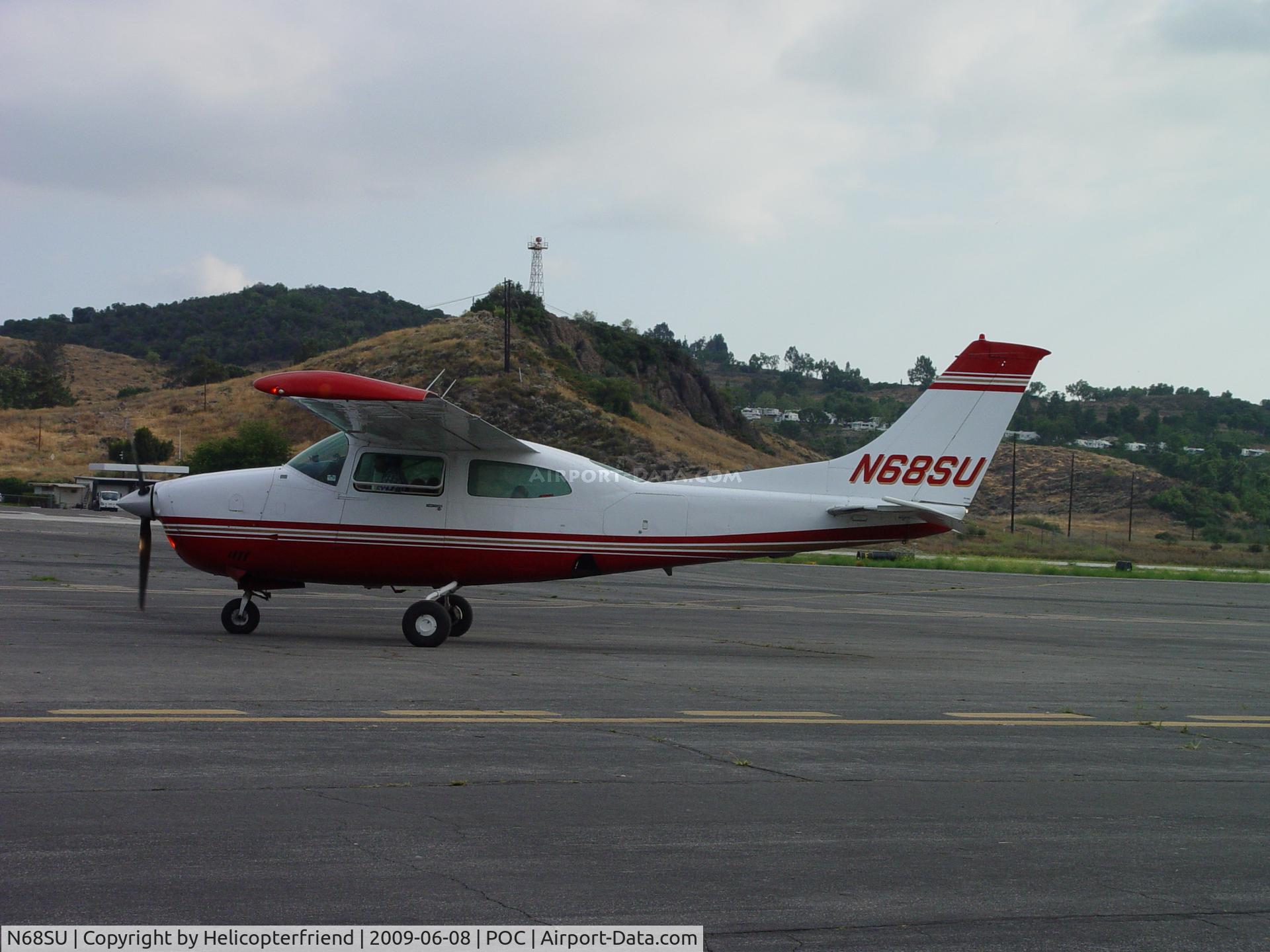 N68SU, 1977 Cessna 210 C/N 21061823, Taxiing to runway 26R