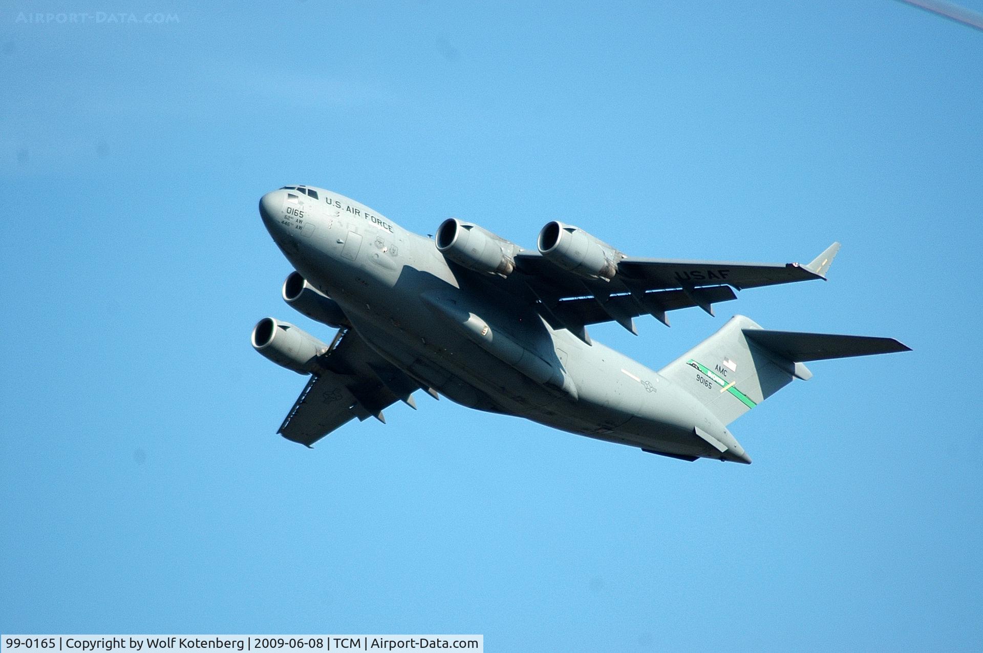 99-0165, 1999 Boeing C-17A Globemaster III C/N 50069/P-65, Taking off from the tacoma area