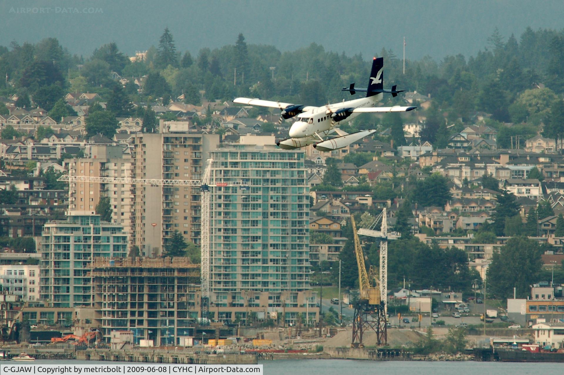 C-GJAW, 1968 De Havilland Canada DHC-6-200 Twin Otter C/N 176, landing at Coal Harbour,Vancouver BC
