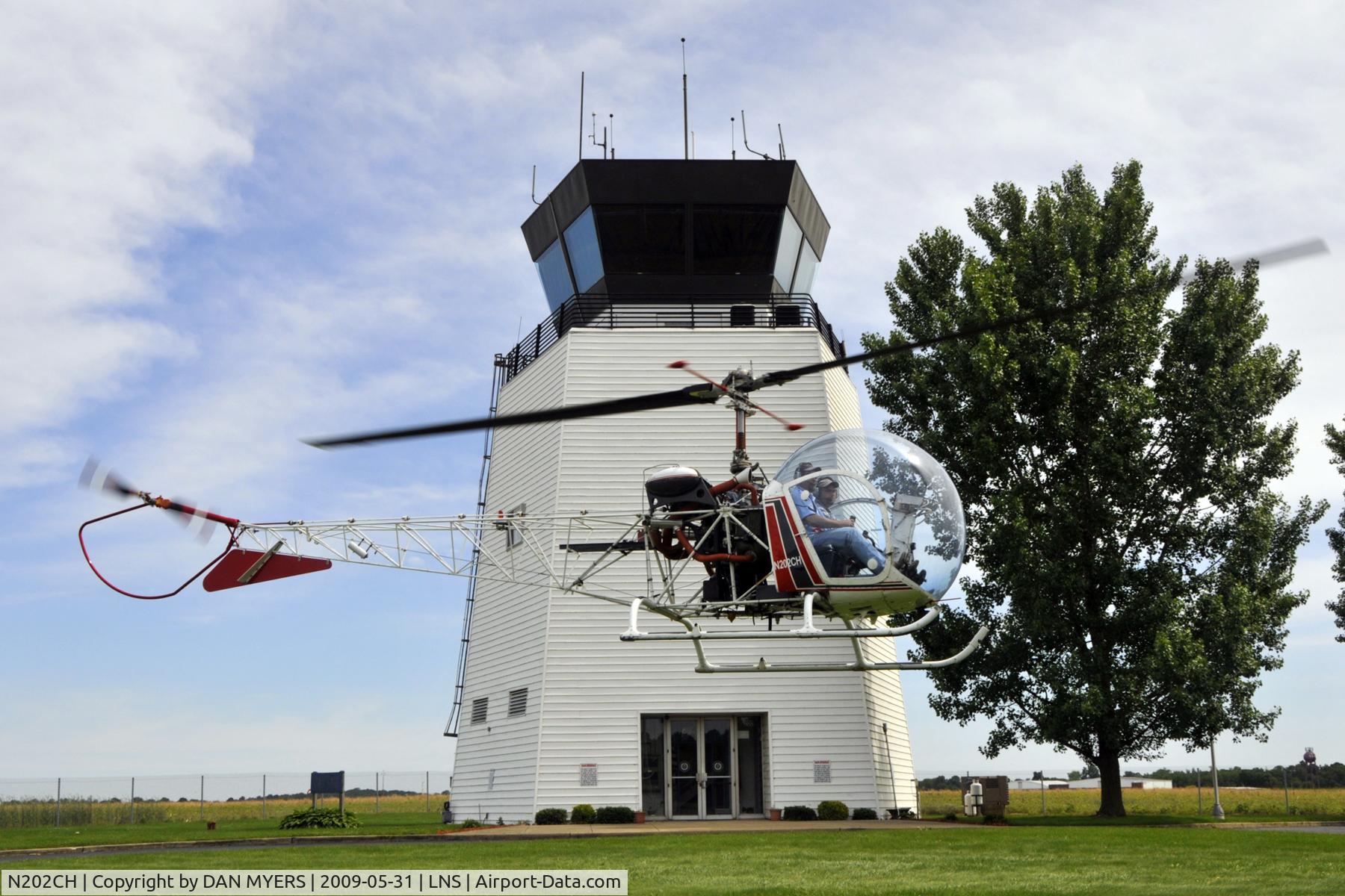 N202CH, 1951 Bell 47D-1 C/N 301, N202CH DEPARTING FROM THE BASE OF THE CONTROL TOWER