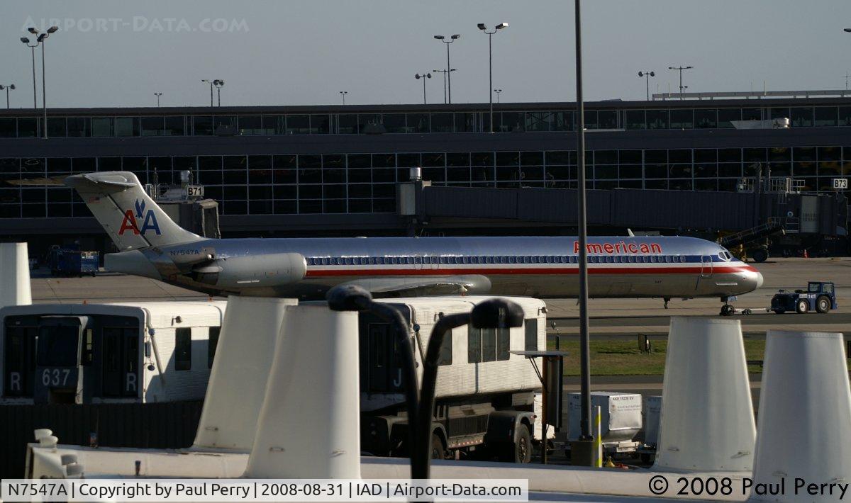 N7547A, 1990 McDonnell Douglas MD-82 (DC-9-82) C/N 53029, American getting a helping hand from a tug