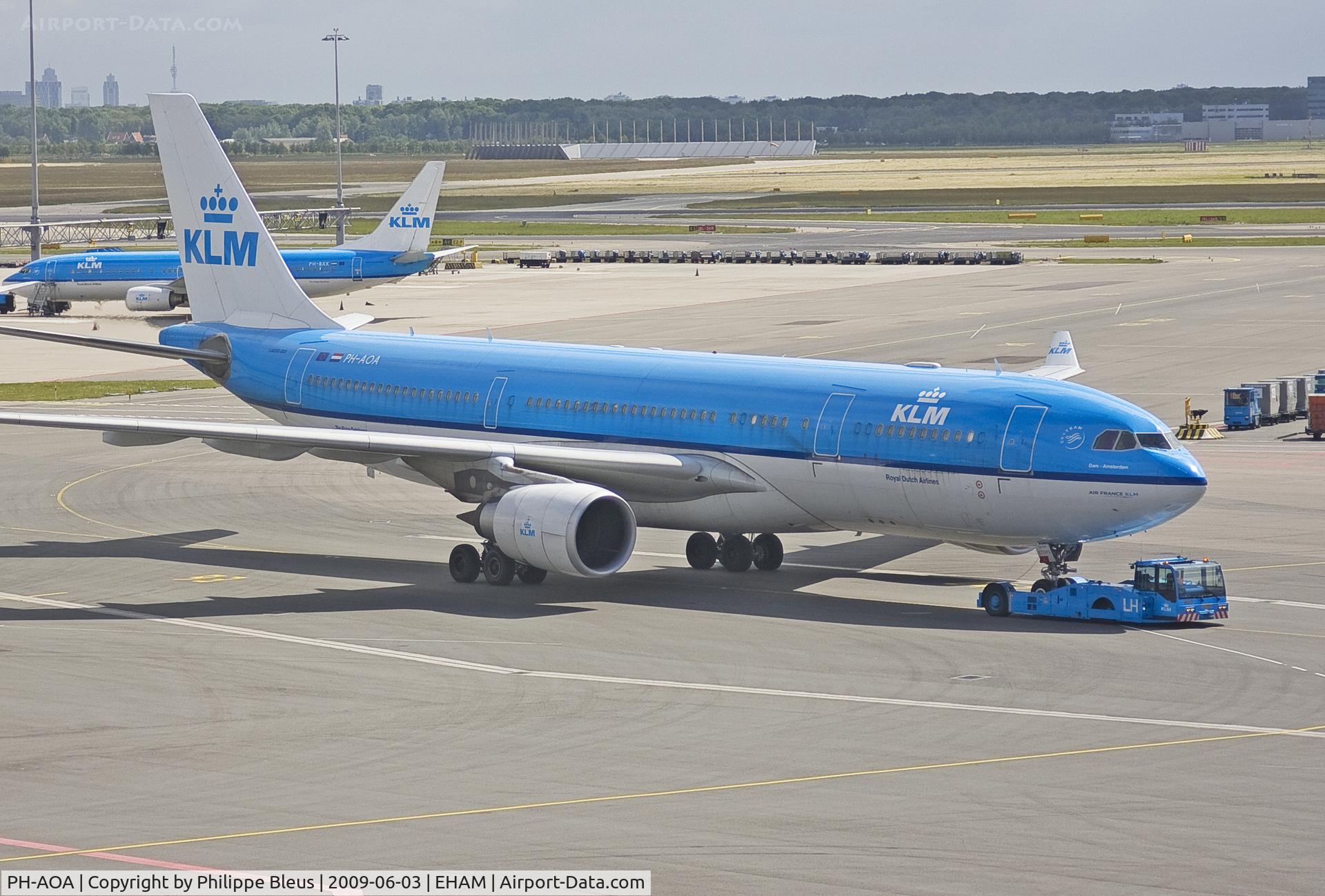 PH-AOA, 2005 Airbus A330-203 C/N 682, Being towed to gate before embarking passengers.