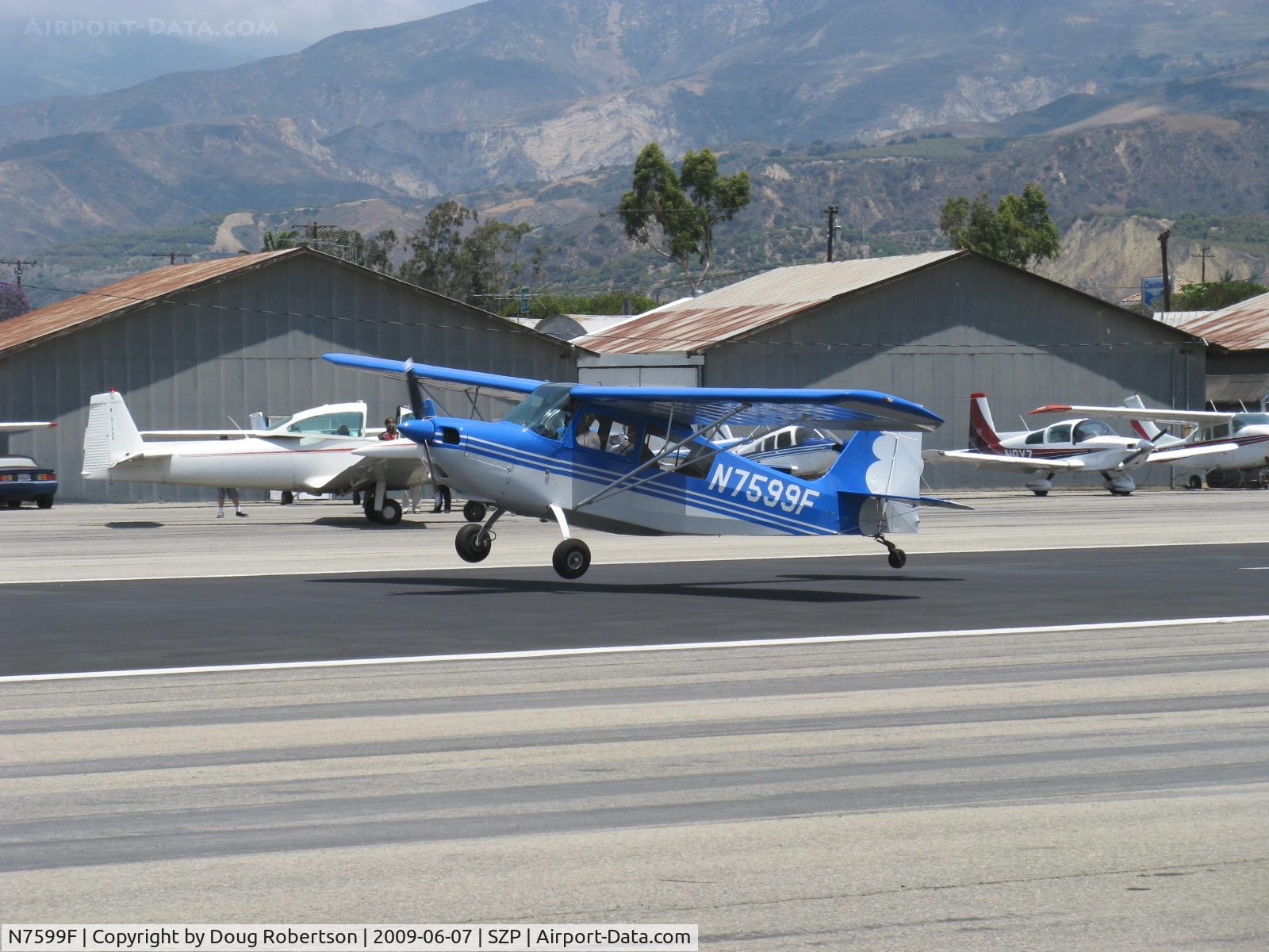 N7599F, 1970 Champion 7ECA Citabria C/N 745-70, 1970 Champion 7ECA CITABRIA, Lycoming O-235 115 Hp, Young Eagles Flight landing Rwy 22 (flown by an older Eagle)