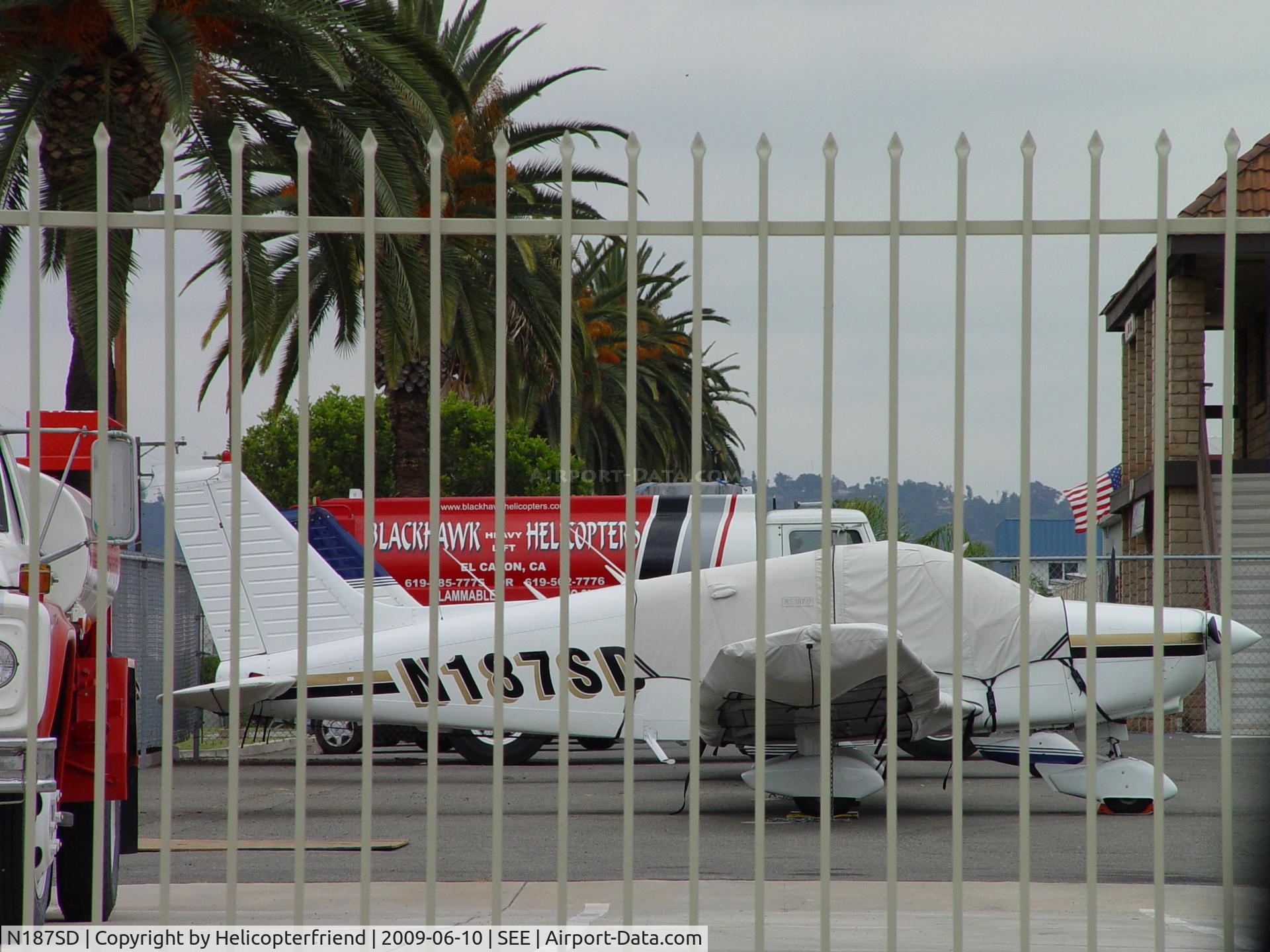 N187SD, Piper PA-28-161 C/N 2841065, Hidden behind a fence and covered up
