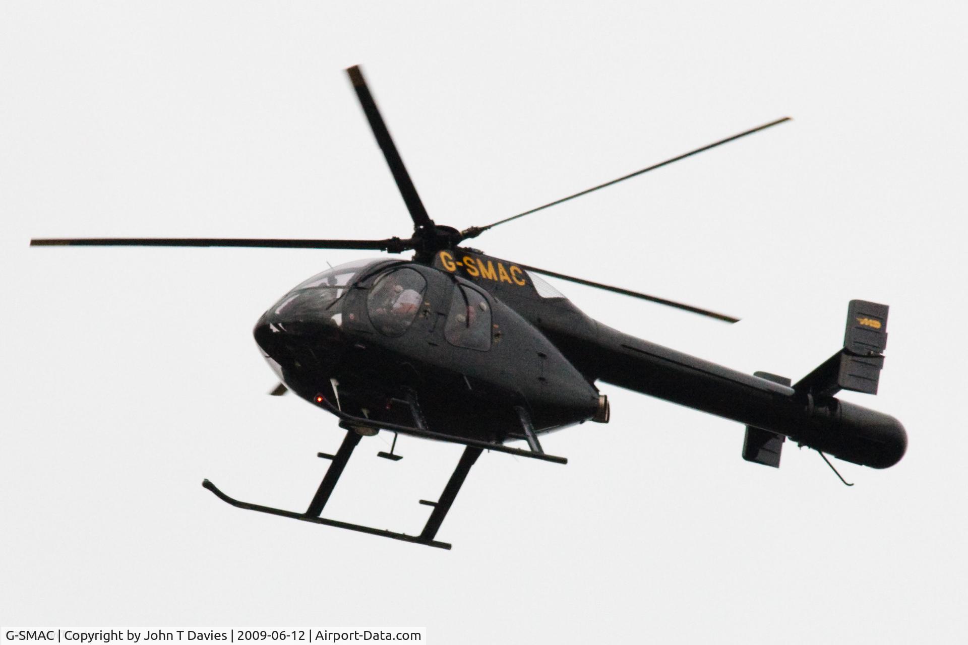 G-SMAC, 1992 McDonnell Douglas 500N C/N LN020, Taken with 420mm (300x1.4) as it flew over a sports day event in Ealing, West London 10:55BST 12/06/09