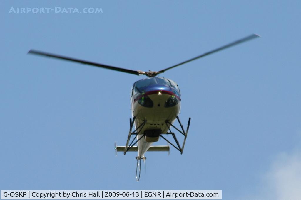 G-OSKP, 1994 Enstrom 480 C/N 5002, departing from Hawarden