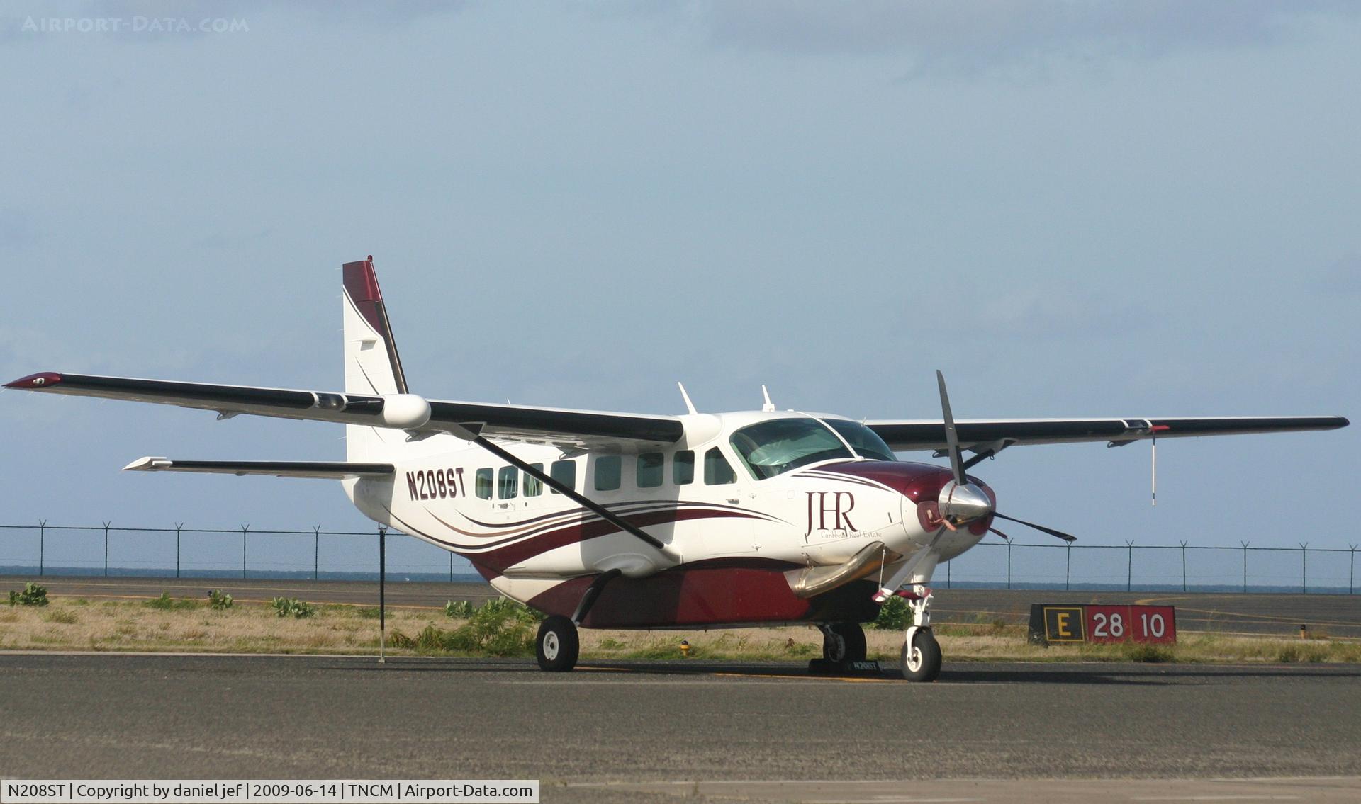 N208ST, 2006 Cessna 208B Grand Caravan C/N 208B1198, park at the  tncm ramp