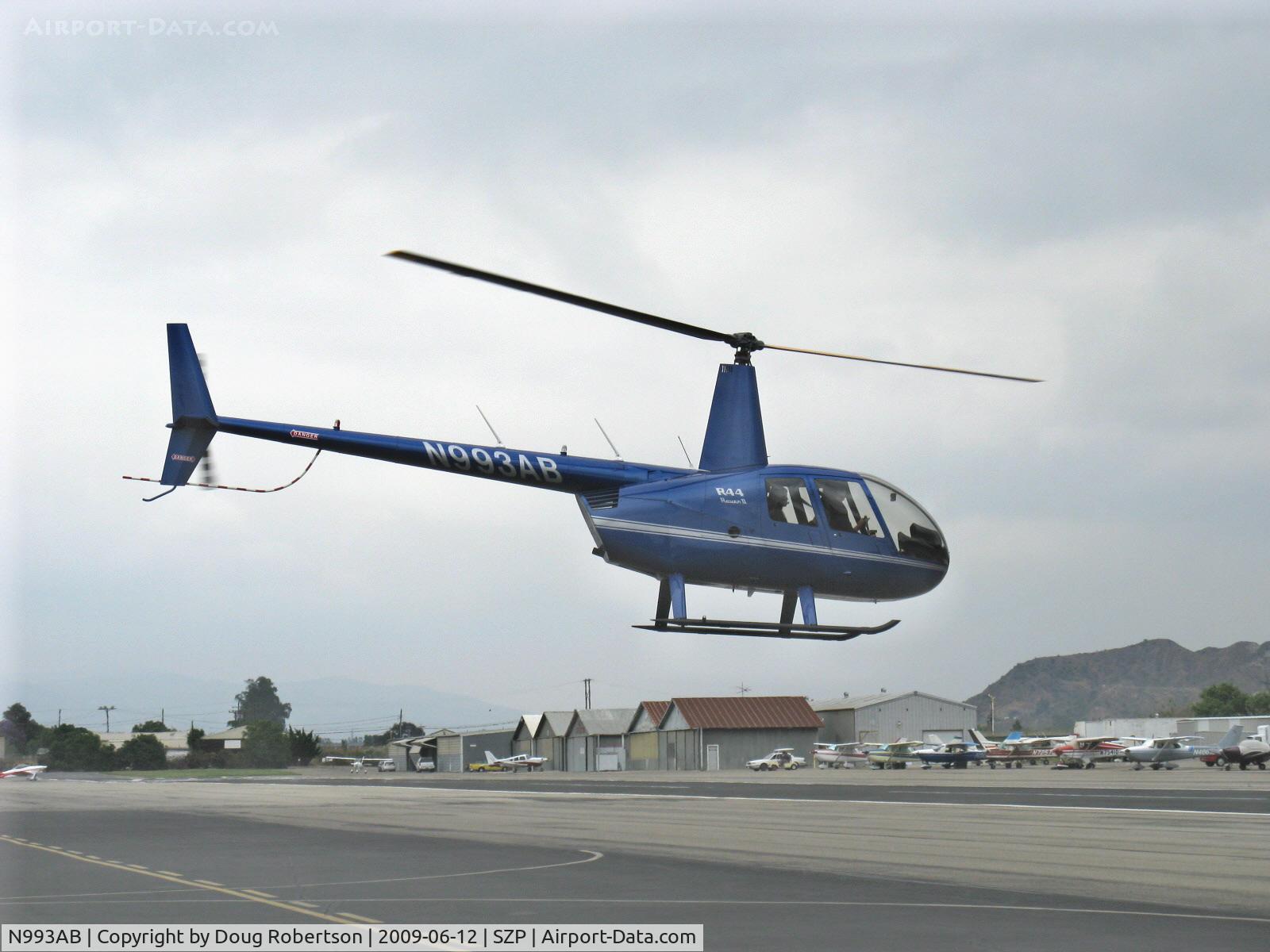 N993AB, Robinson R44 Raven II C/N 12721, 2009 Robinson R44 RAVEN II, Lycoming IO-540 derated to 245 Hp for 5 minutes, 205 Hp continuous, crossing over Rwy 22