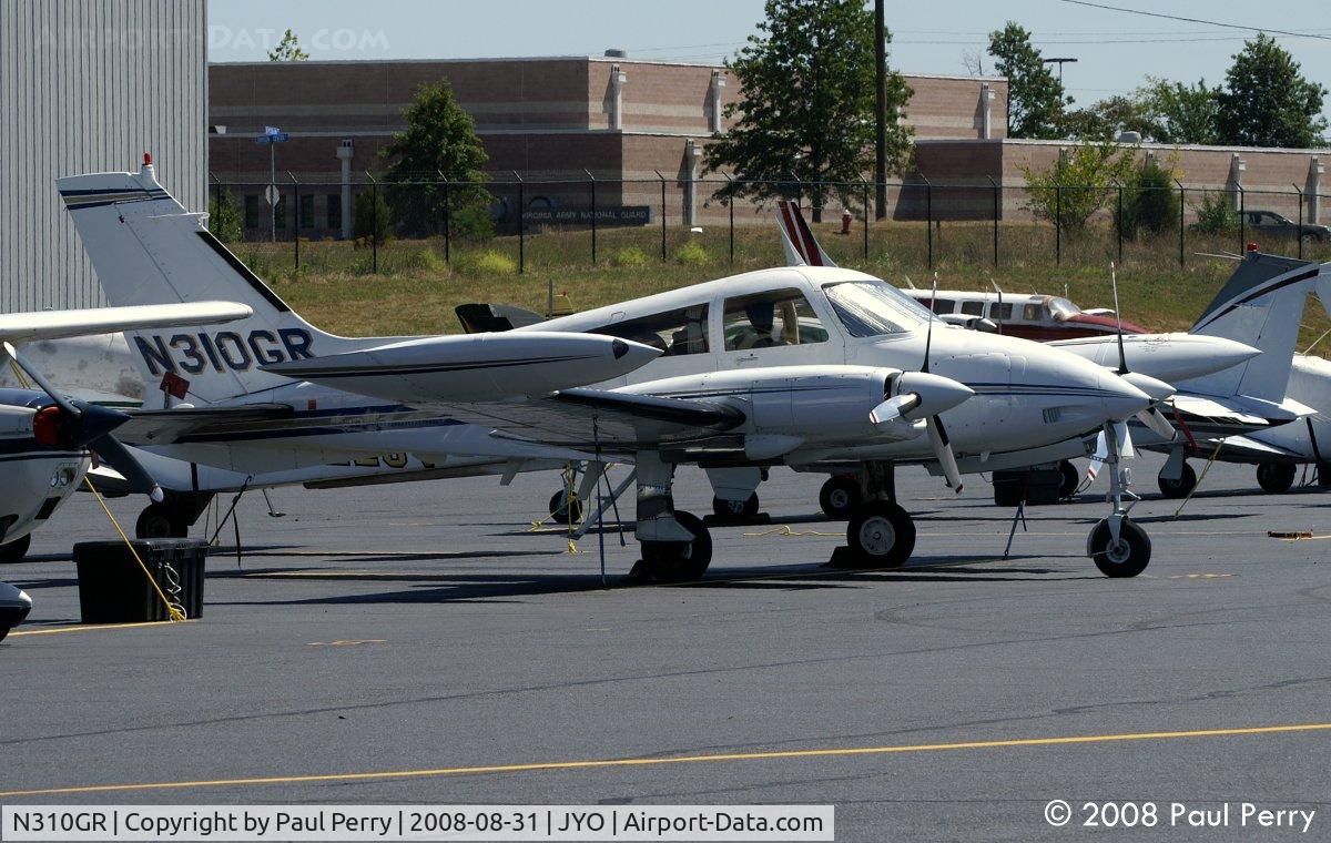 N310GR, 1968 Cessna 310P C/N 310P0064, Quite a wide variety on the ramp here