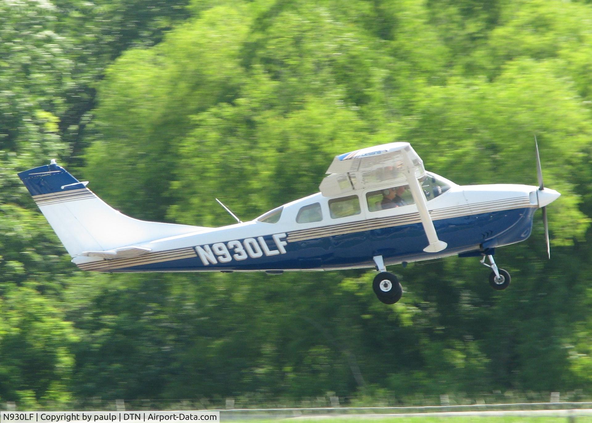 N930LF, 1966 Cessna 210F Centurion C/N 21058766, Landing on 14 at Downtown Shreveport.