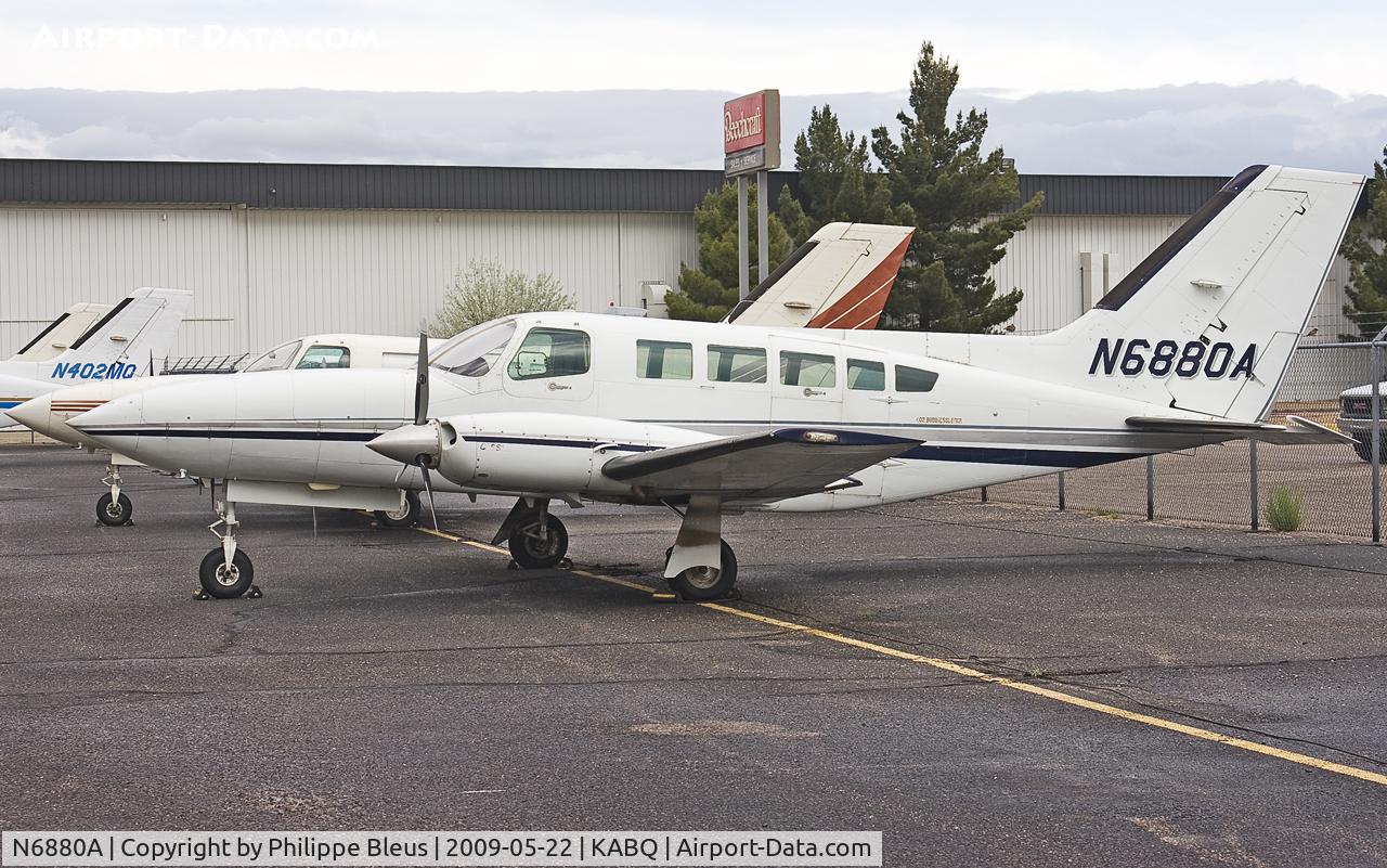 N6880A, 1981 Cessna 402C C/N 402C0616, With her twin behind.