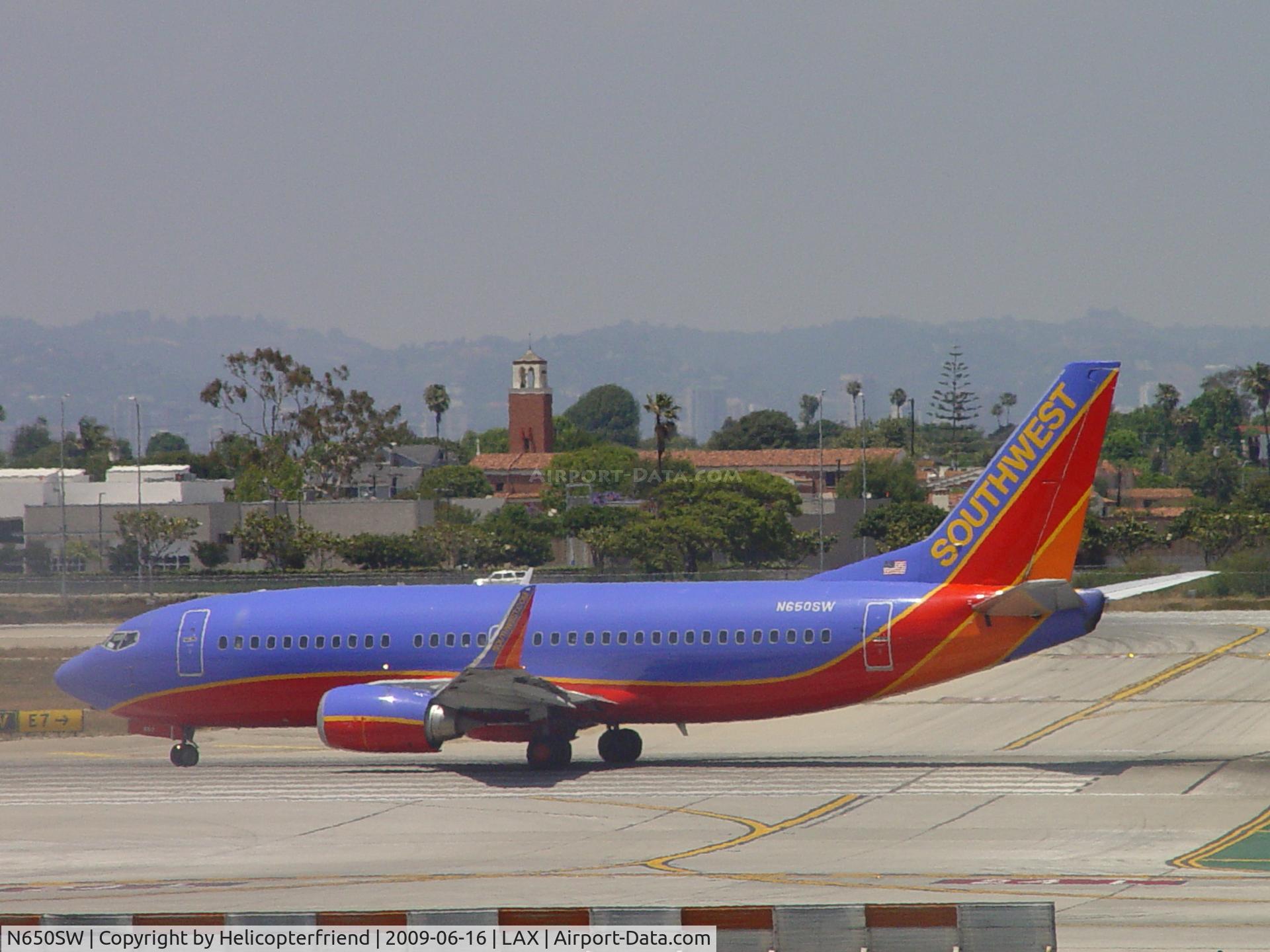N650SW, 1997 Boeing 737-3H4 C/N 27720, Taxiing onto 24L for take off