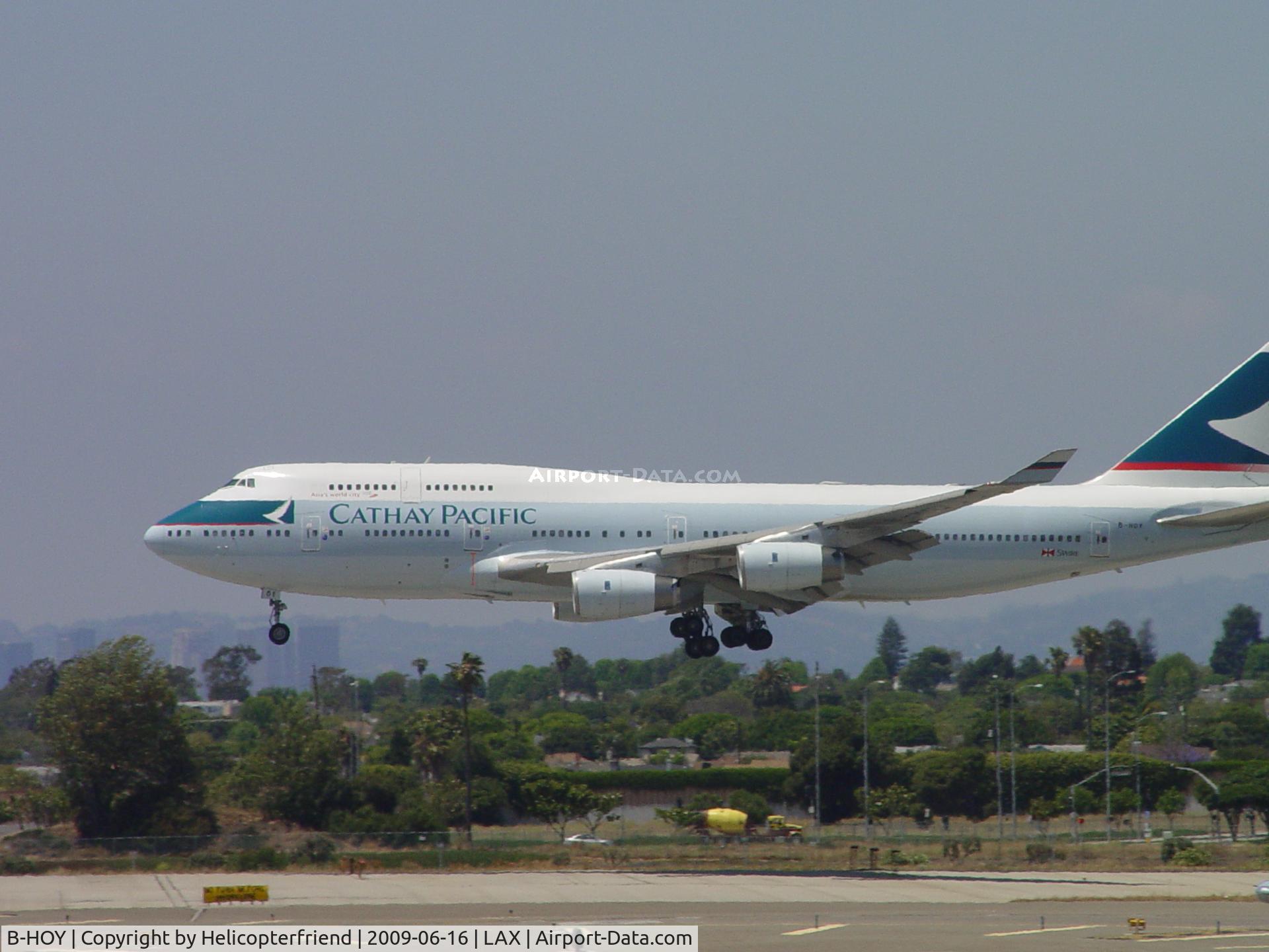 B-HOY, 1991 Boeing 747-467 C/N 25351, Landing on 24R