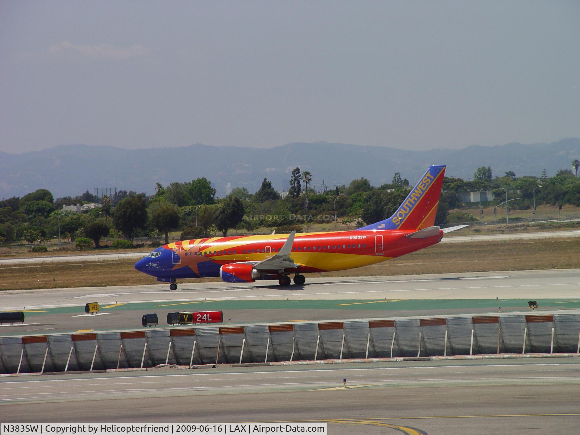 N383SW, 1994 Boeing 737-3H4 C/N 26589, Rolling westbound on take off