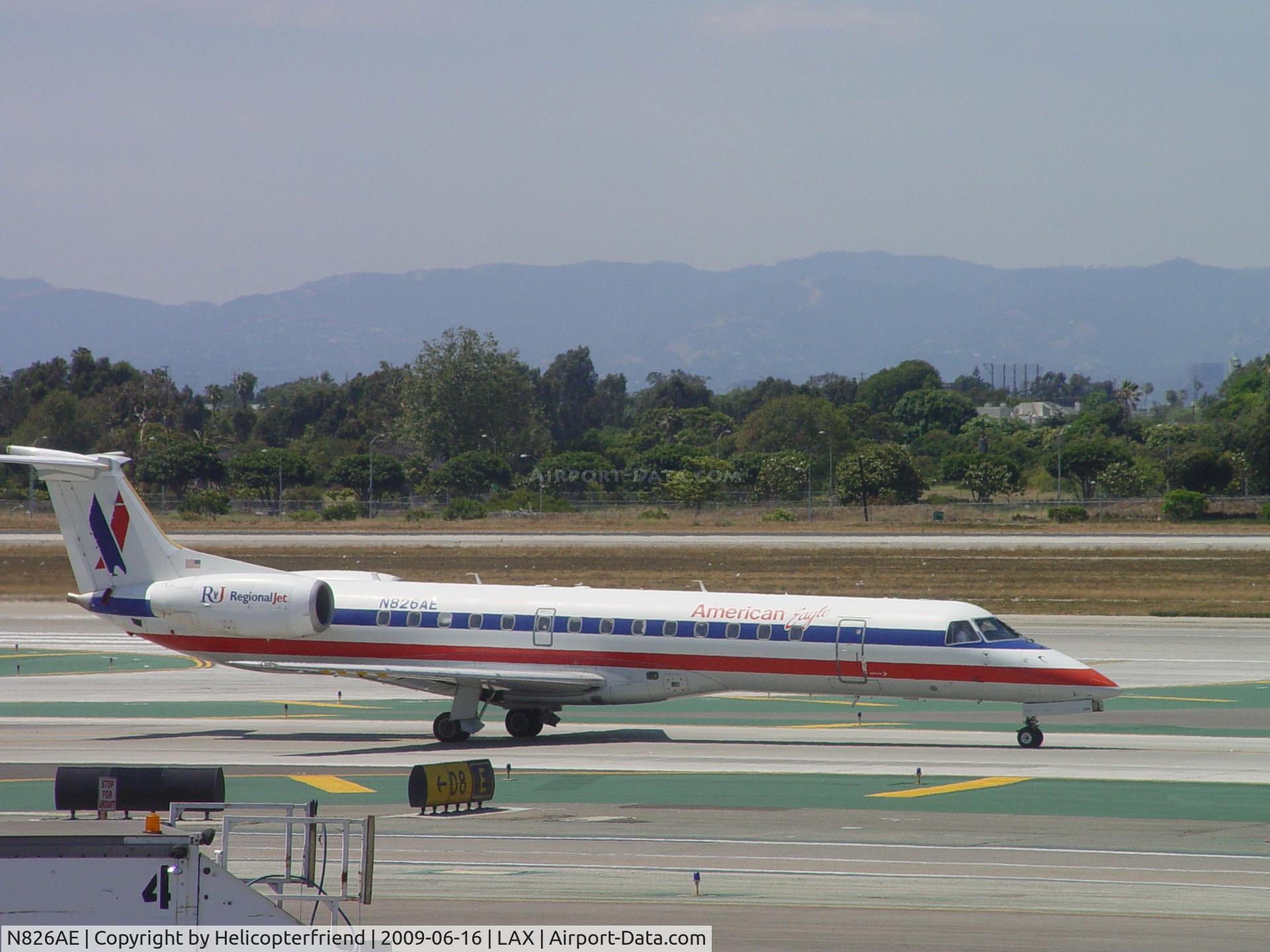 N826AE, 2002 Embraer ERJ-140LR (EMB-135KL) C/N 145592, Taxiing to 24L for take off